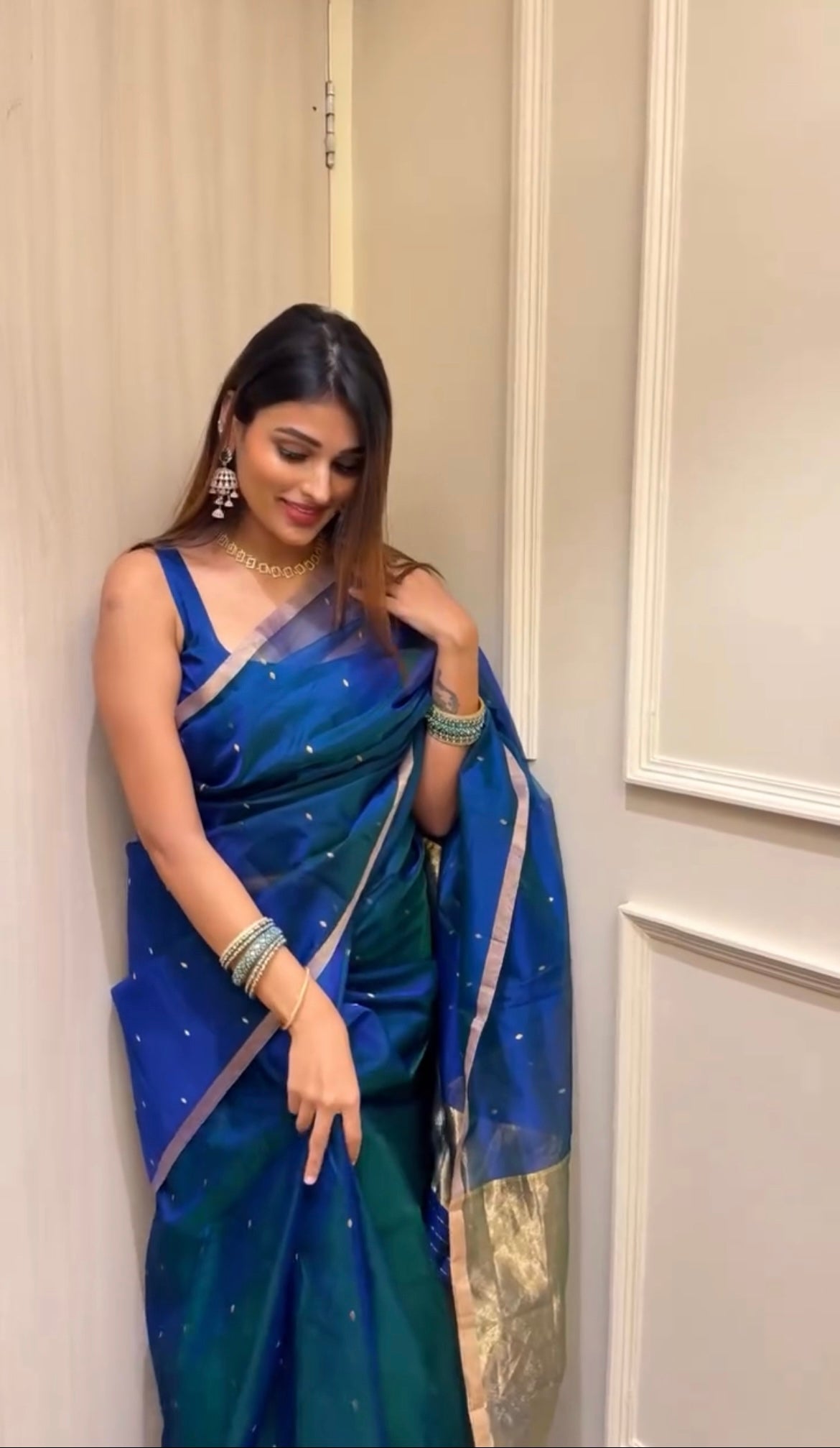 Peacock blue and green dual tone Chanderi organza silk saree with zari bootis all over