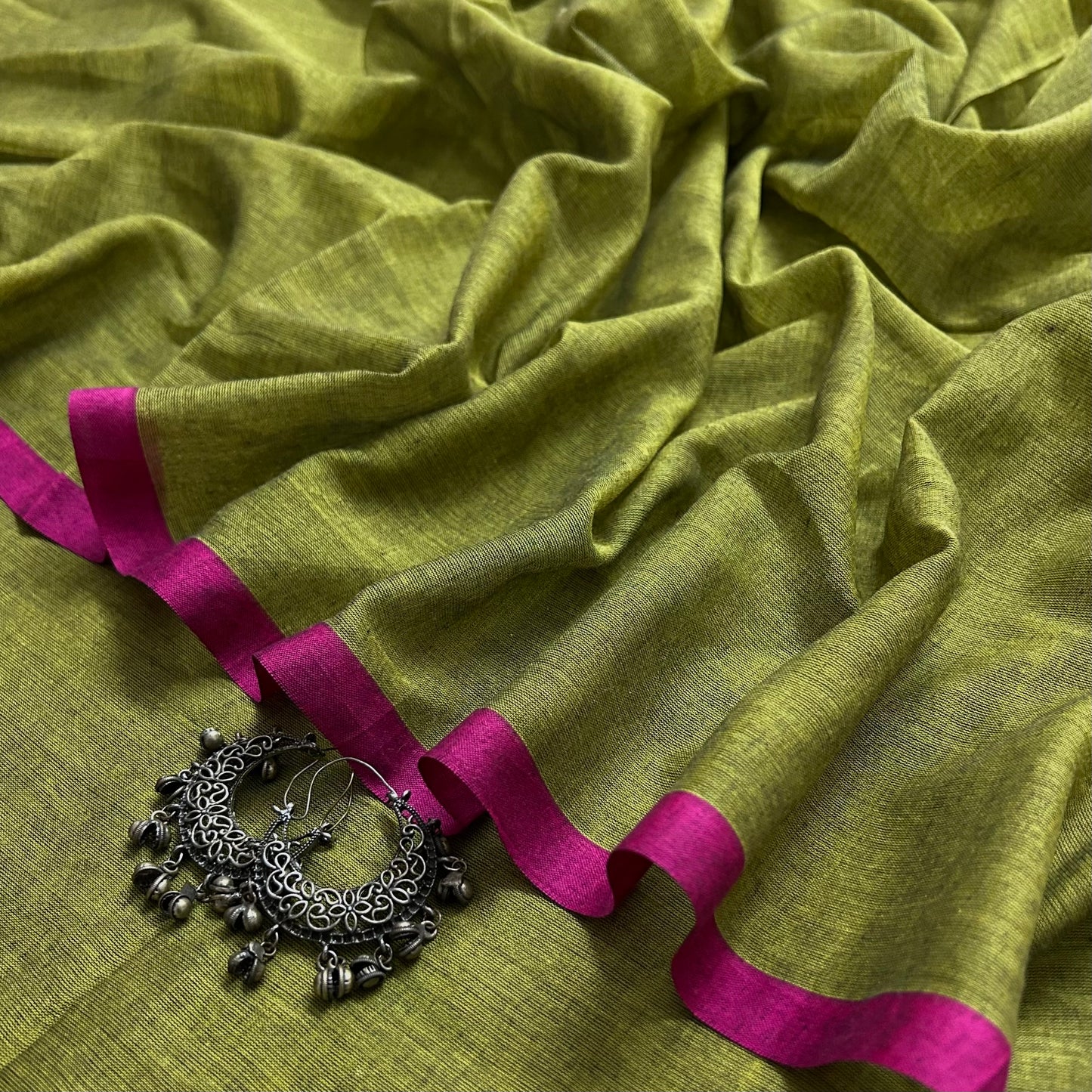Olive green and pink mulmul saree