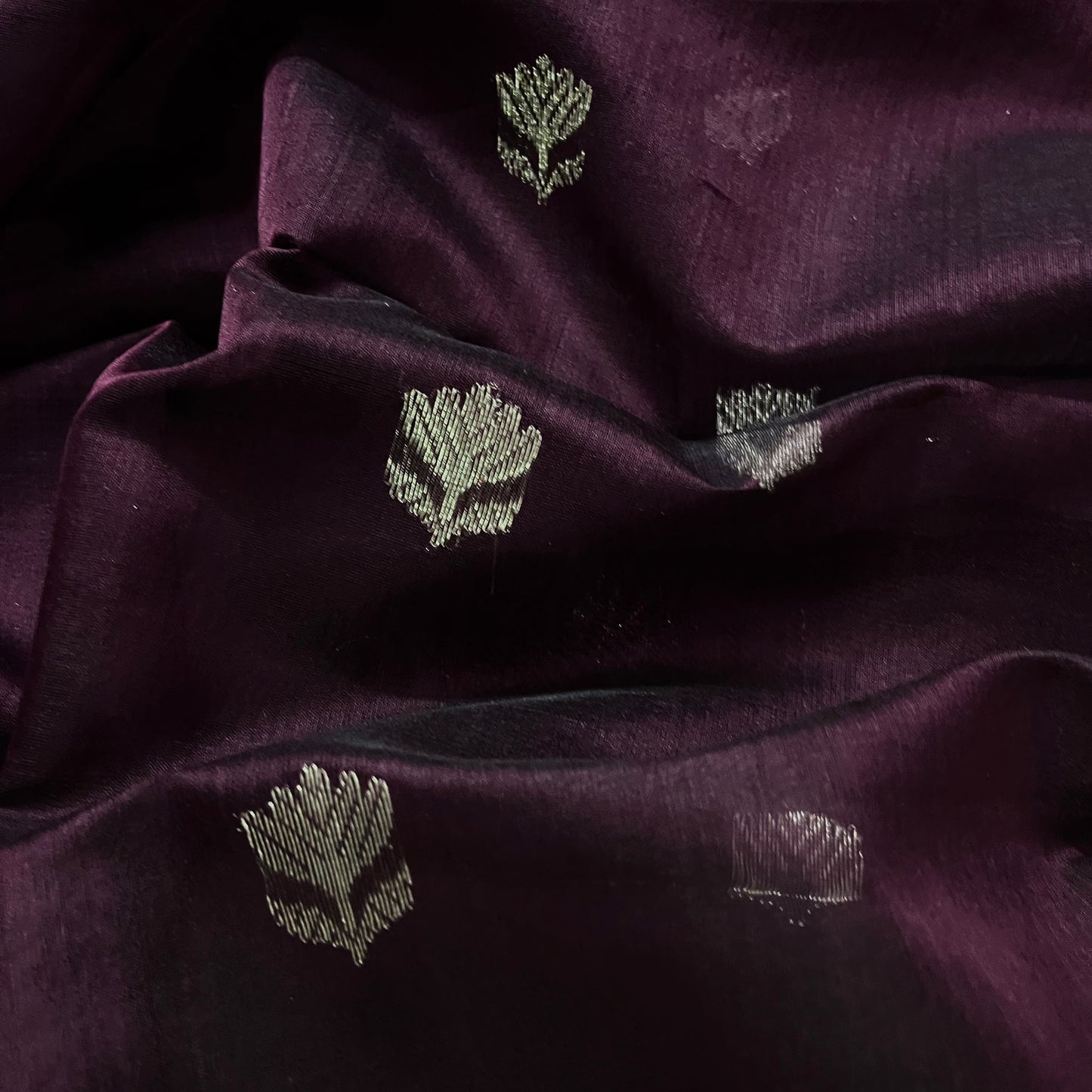 Deep wine Maheshwari saree with flower motifs all over