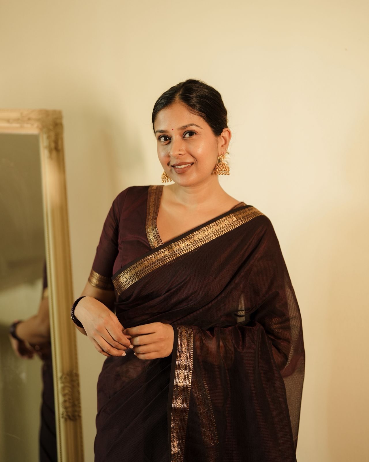 Mahoganay Maheshwari saree with zari border and zari lines on pallu