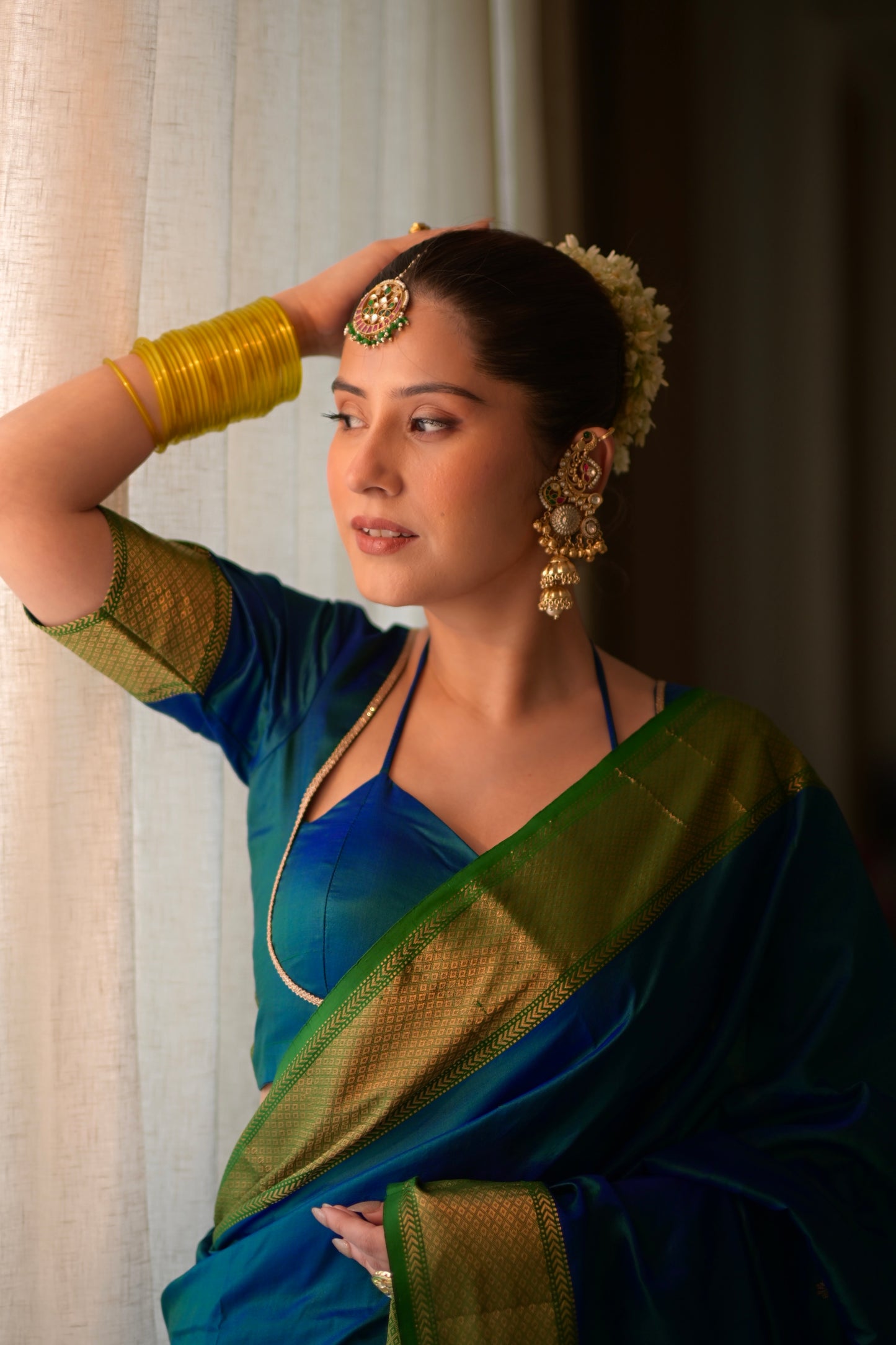 Peacock blue and green dual tone Maheshwari silk saree with zari bootis all over