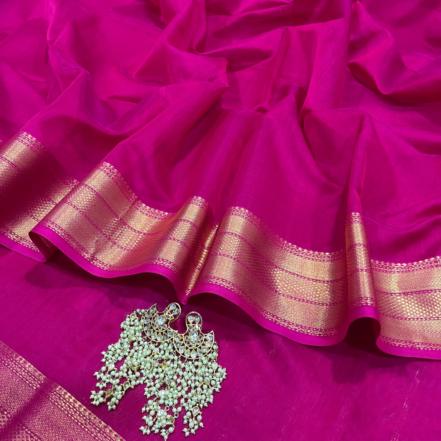 Rani pink Maheshwari saree with zari border