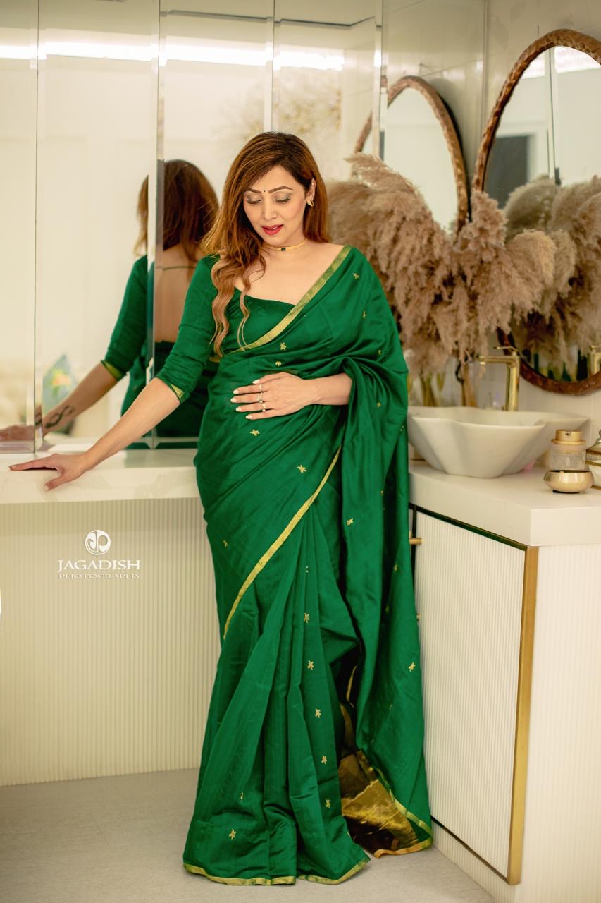 Emerald green chanderi silk saree with flower bootis all over