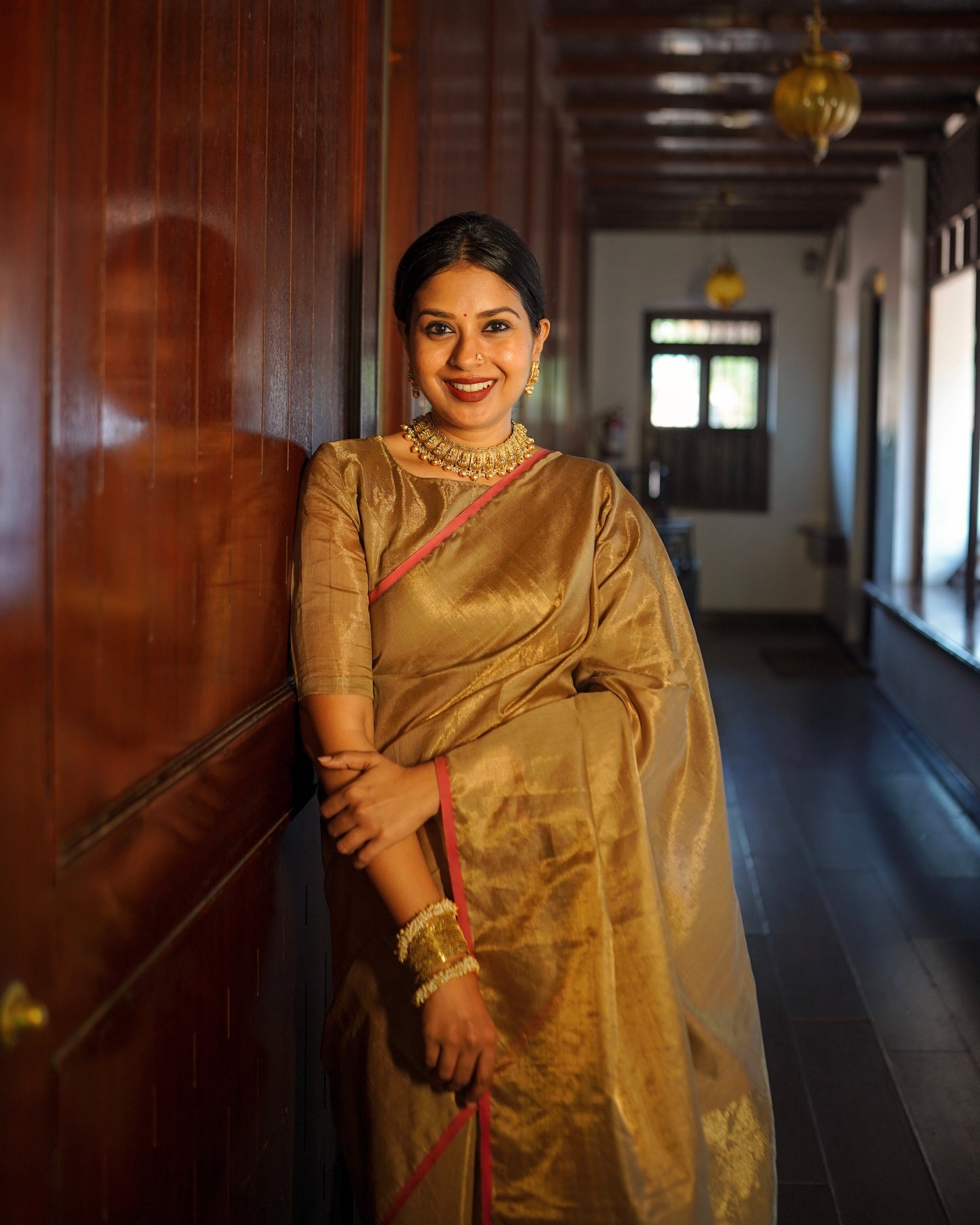 Antique gold & pink maheshwari tissue silk saree with zari lines on pallu