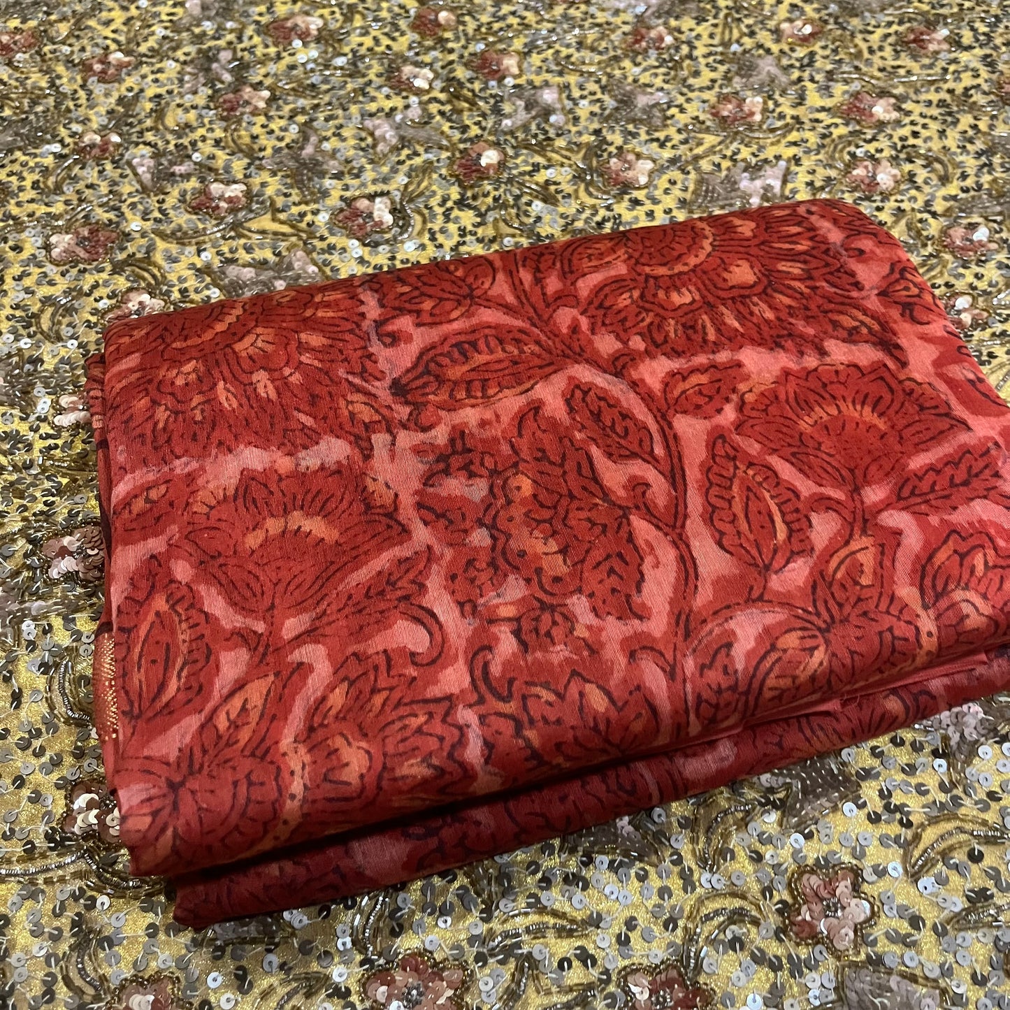 Rust Maheshwari saree with ajrakh print all over