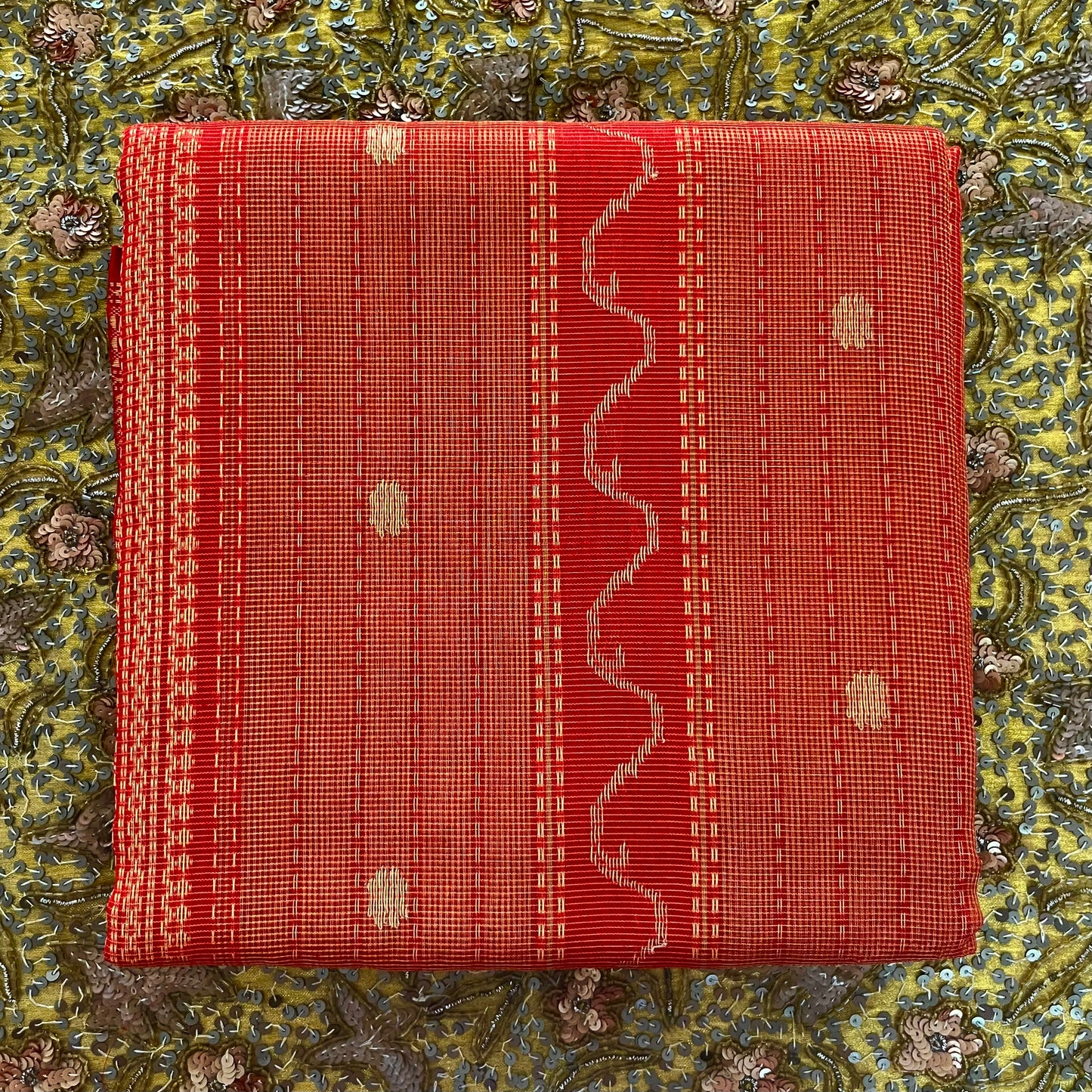 Red and gold Maheshwari silk saree with zari jaal work on pallu
