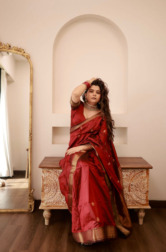 Deep maroon Maheshwari silk saree with zari bootis all over