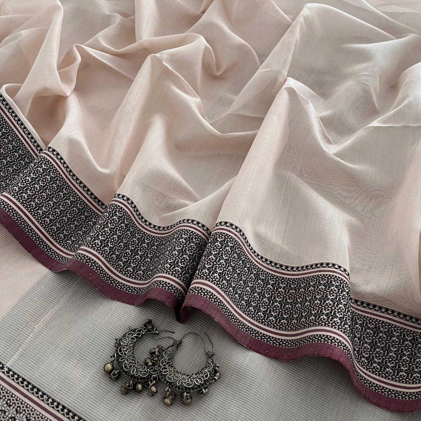 Sand and black Maheshwari saree with resham border
