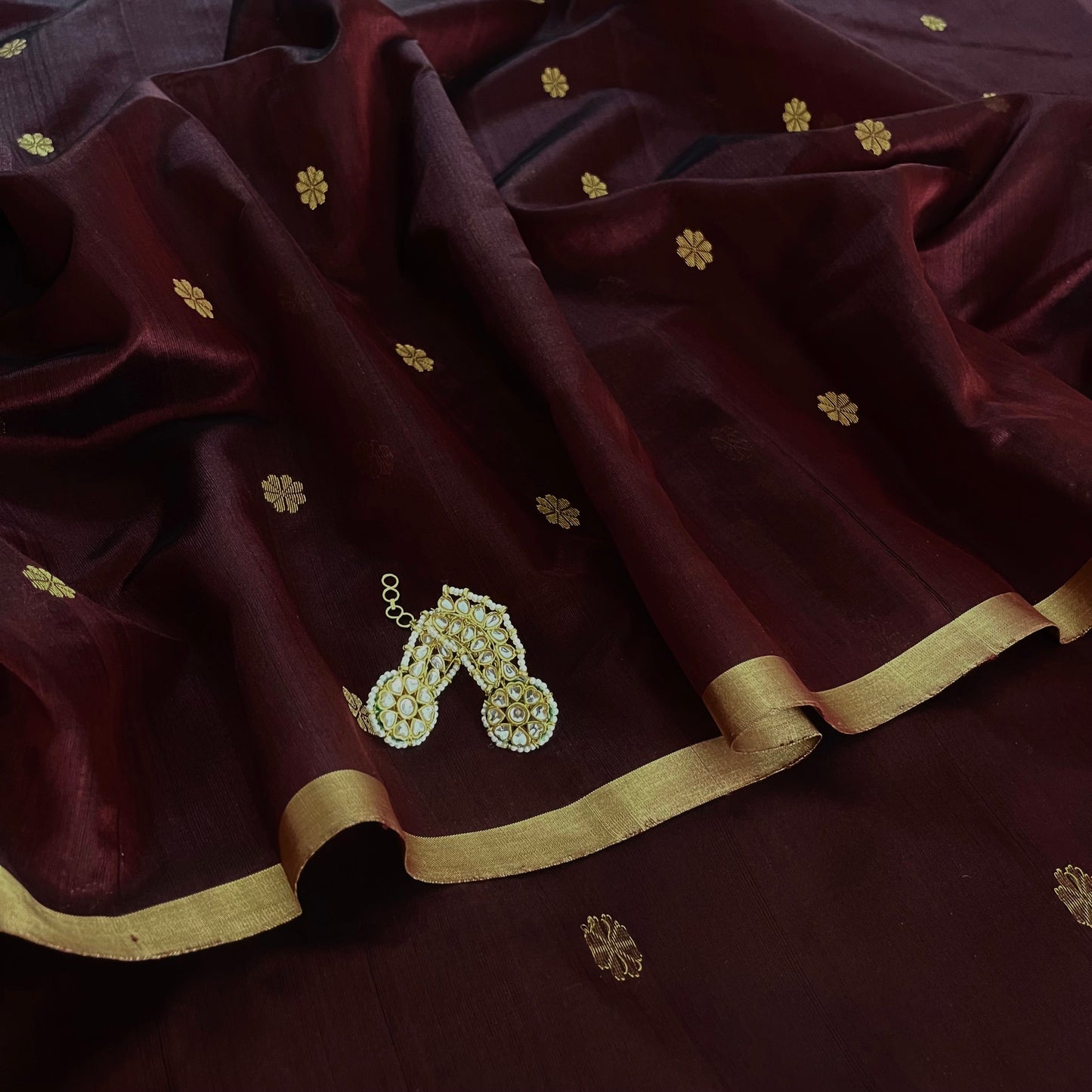 Mahogany Chanderi silk saree with flower bootis all over