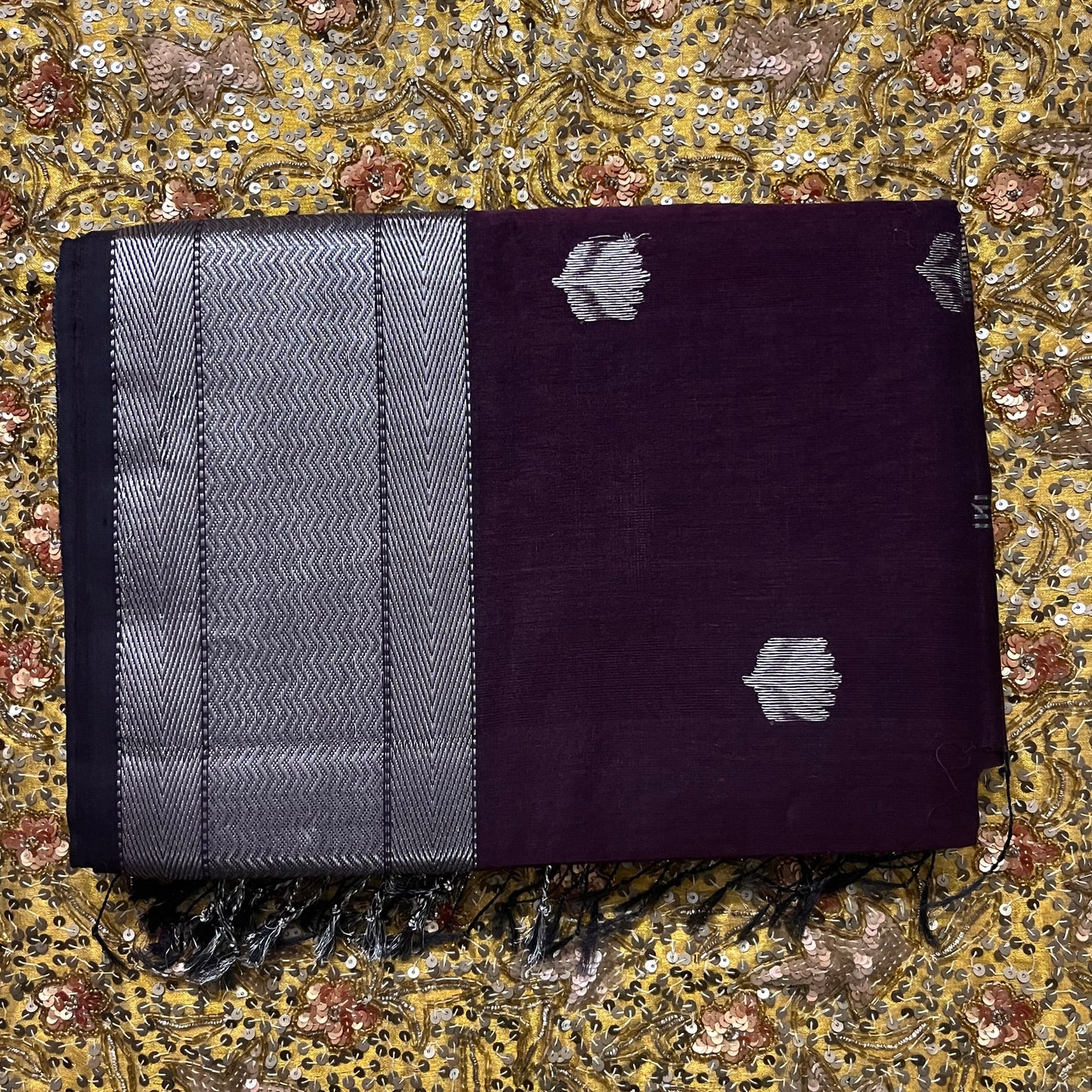 Deep wine Maheshwari saree with flower motifs all over