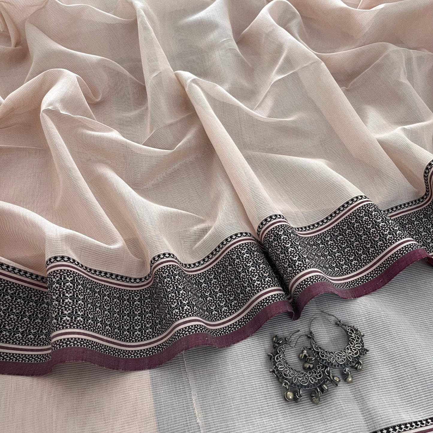 Sand and black Maheshwari saree with resham border