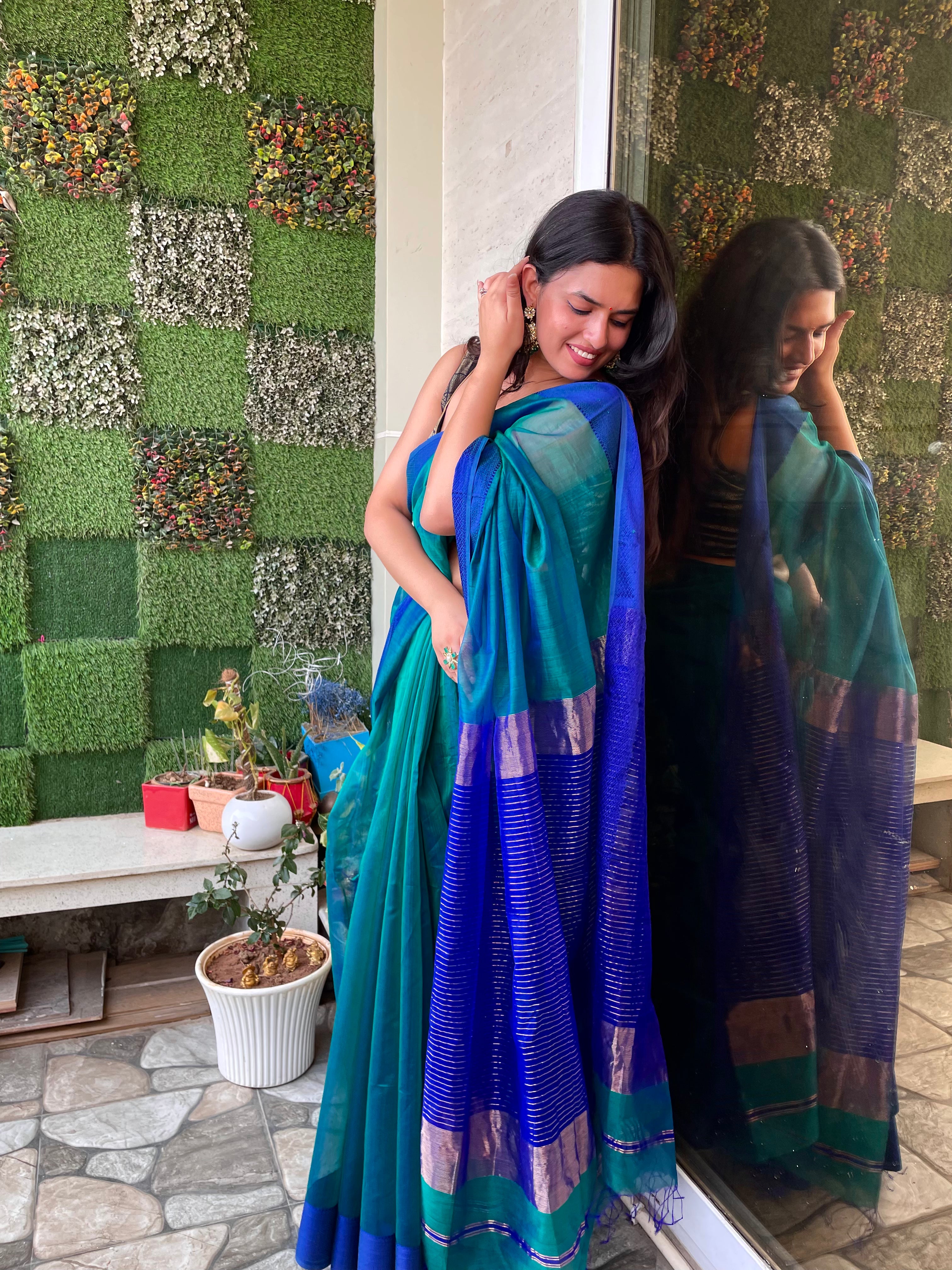 Peacock green and blue dual tone Maheshwari saree with resham border