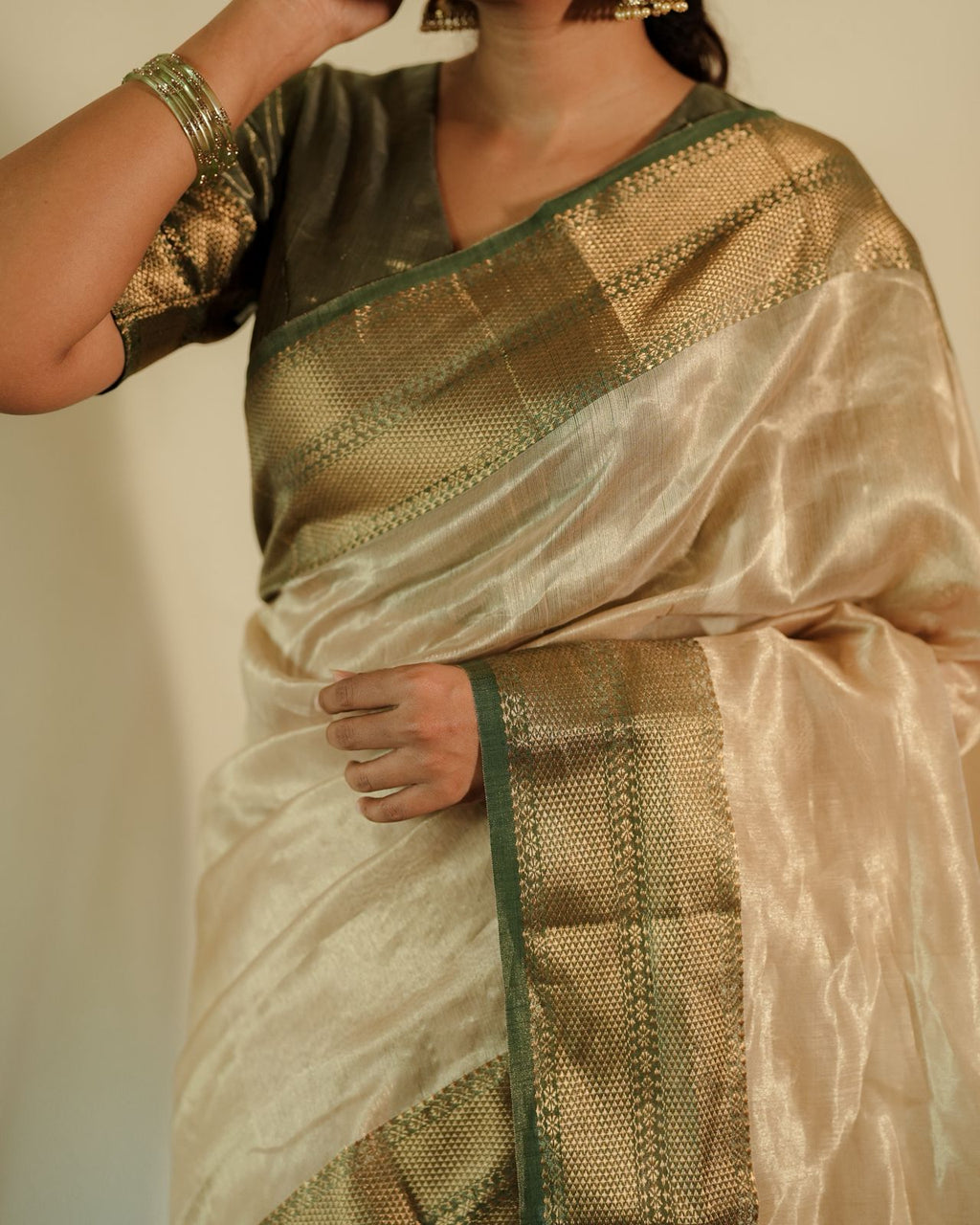 Cream Gold and green Maheshwari tissue silk saree with zari pattern on pallu