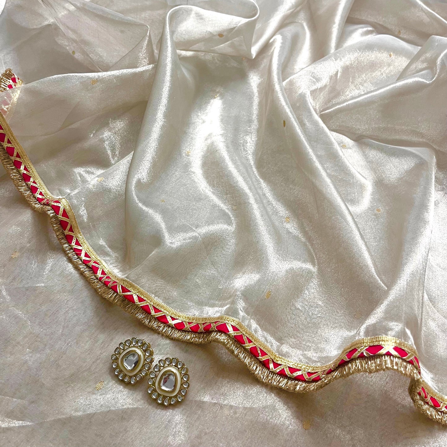 Chantilly cream and red Chanderi tissue silk saree with zari bootis all over