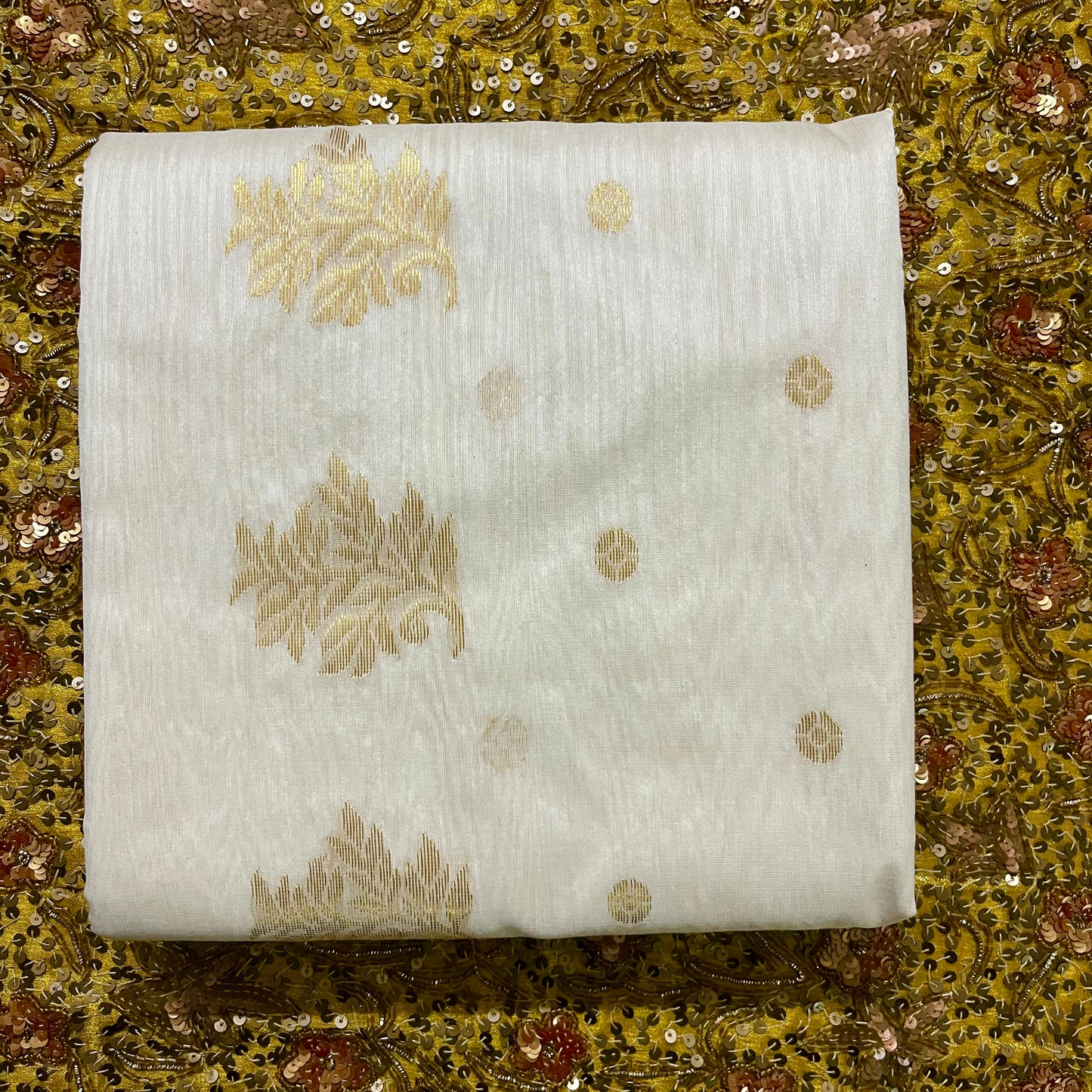 Off white Chanderi saree with zari bootis all over and zari motifs on pallu