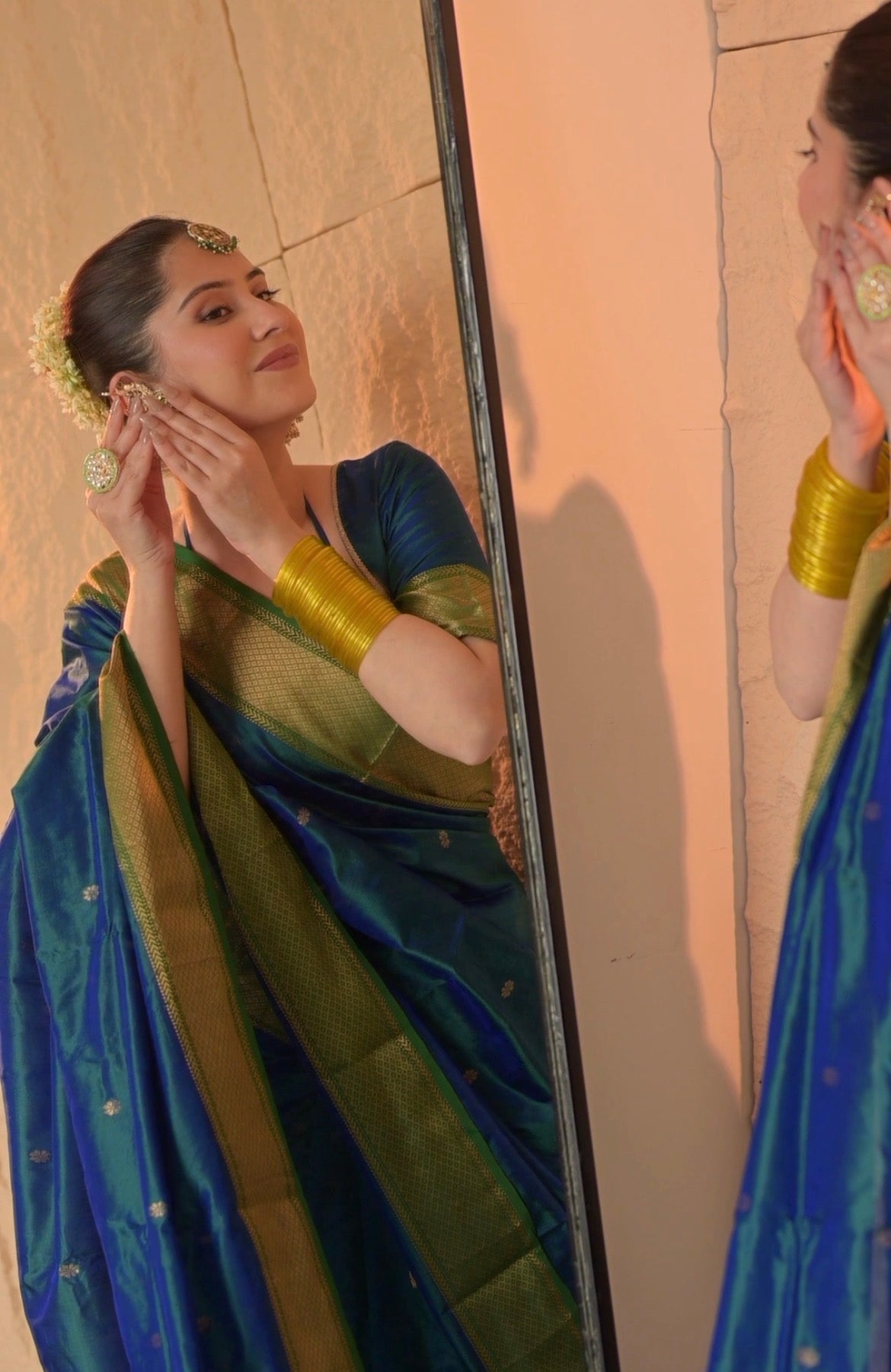 Peacock blue and green dual tone Maheshwari silk saree with zari bootis all over