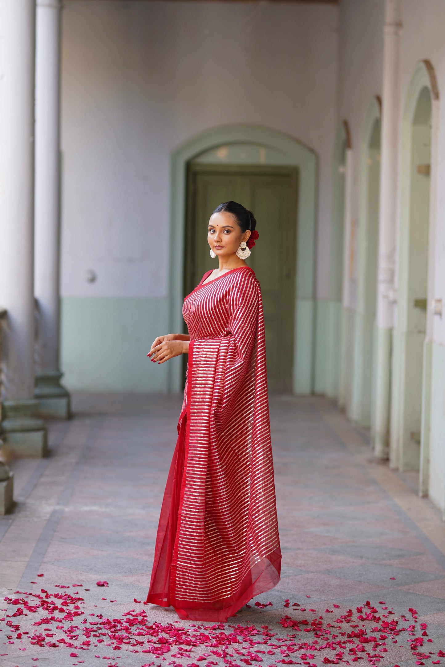 Deep red chanderi saree with intricate gota work all over