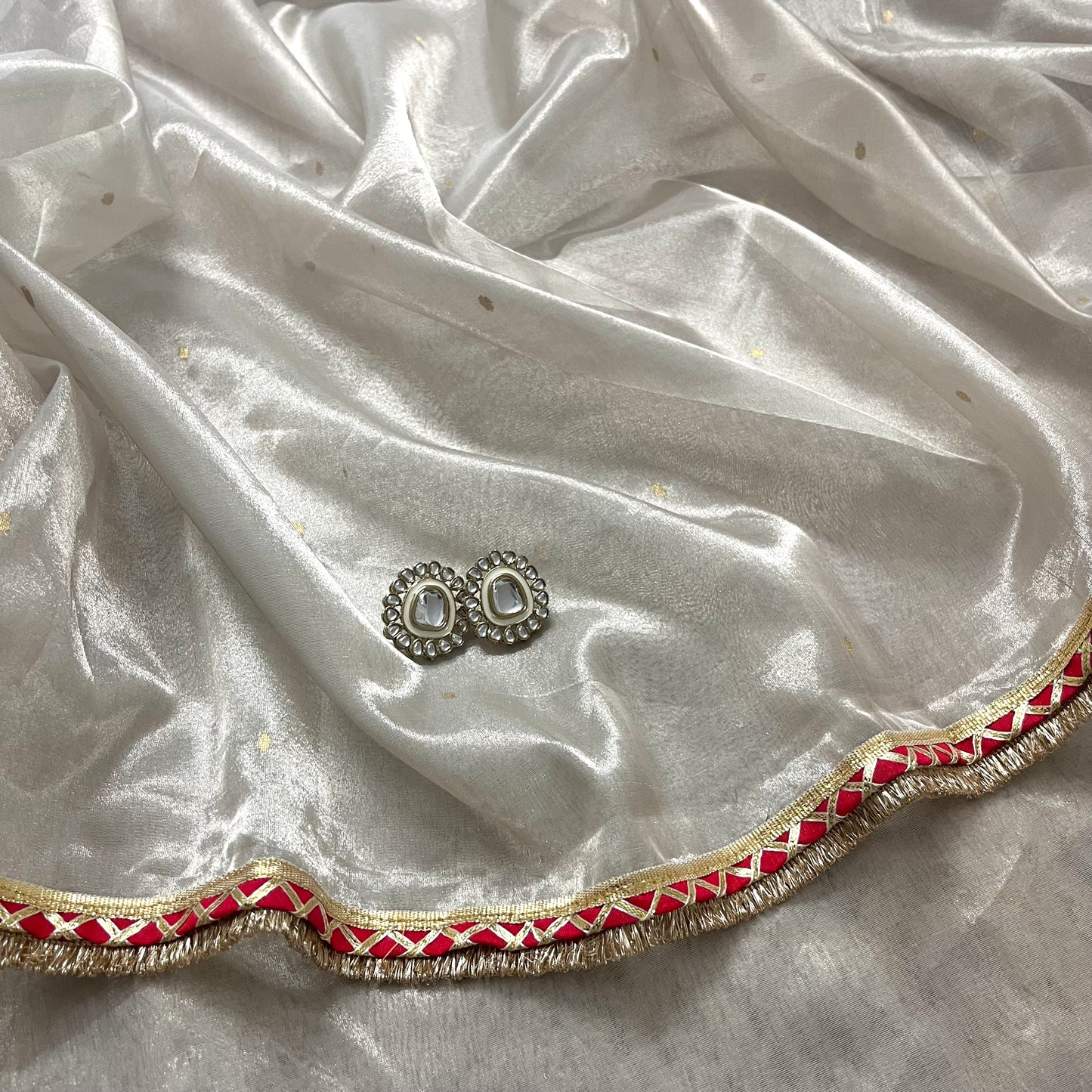 Off white and red Chanderi tissue silk saree with zari bootis all over