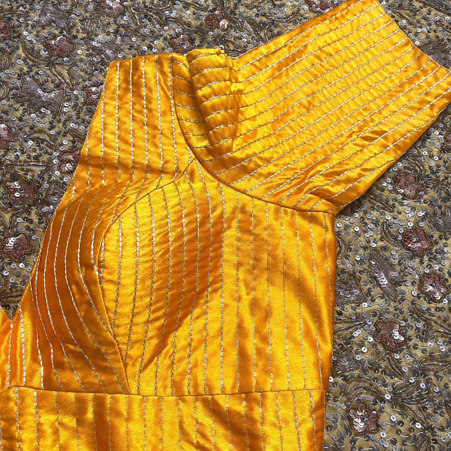 Yellow stitched V neck blouse