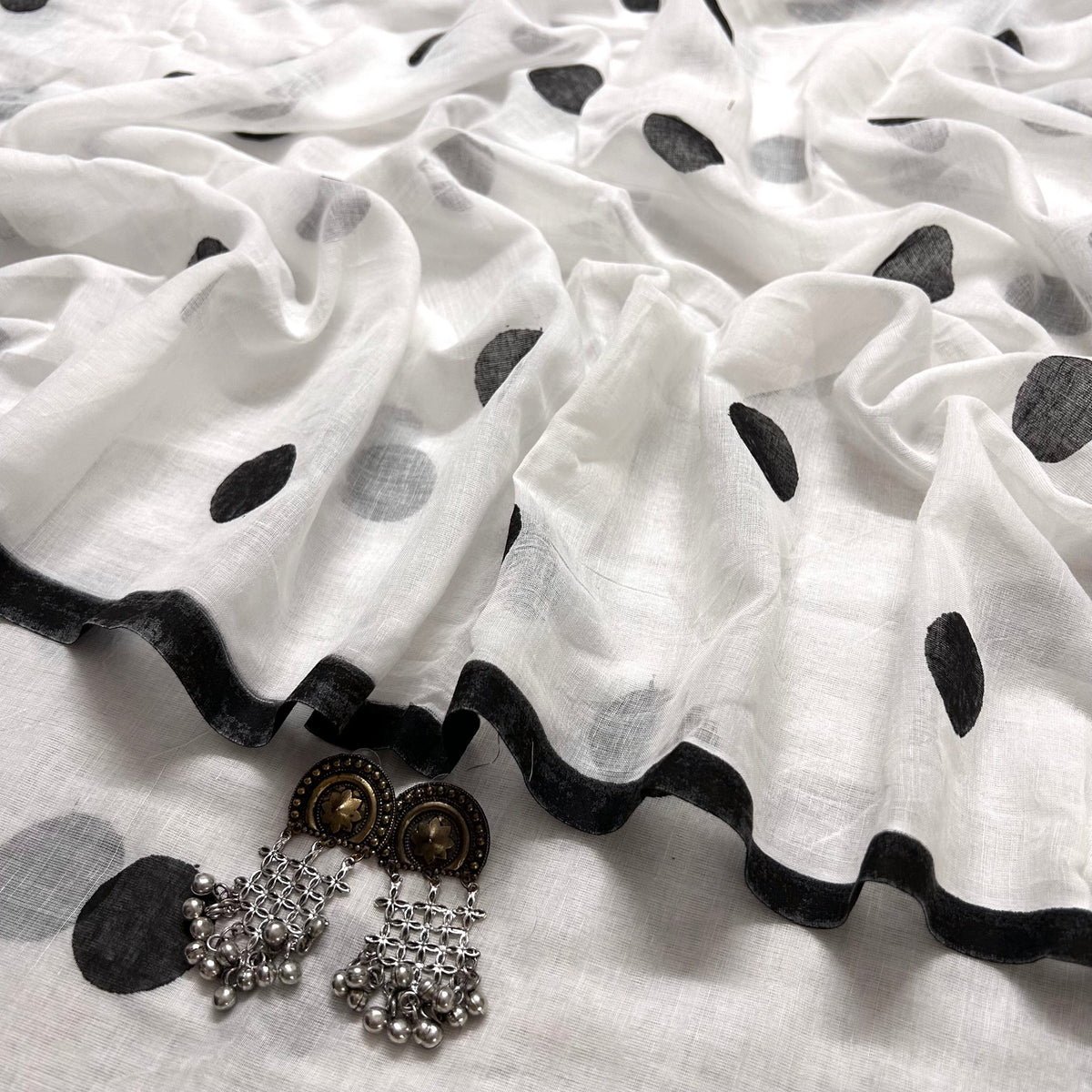 White and black polka dots mulmul saree