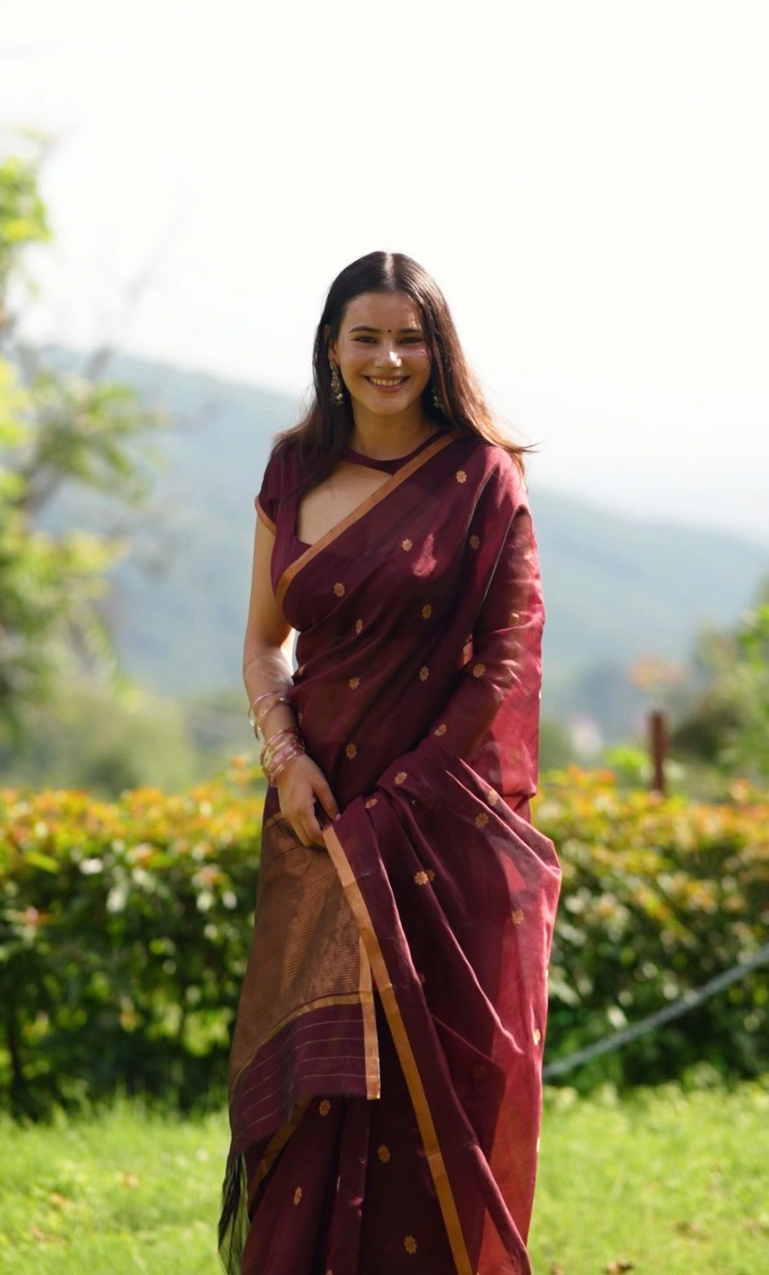 Mahogany Chanderi silk saree with flower bootis all over