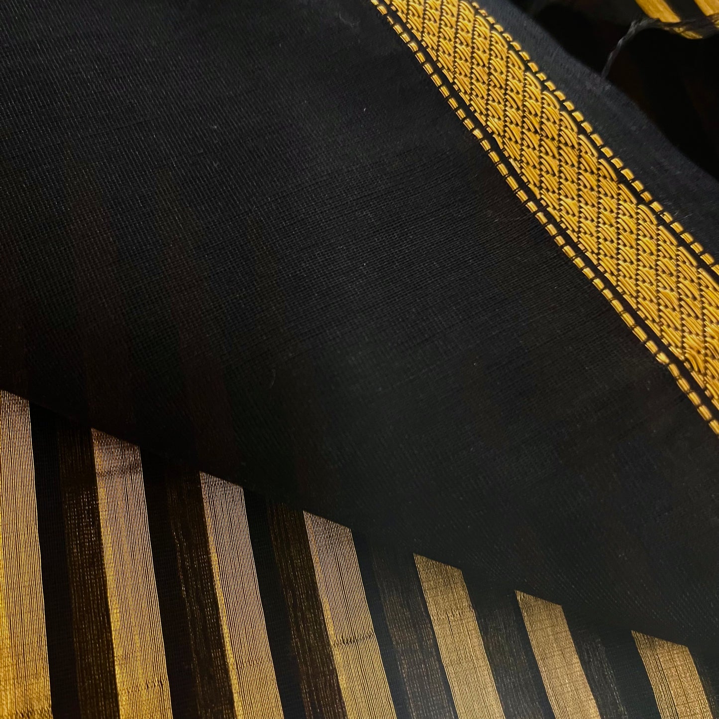 Black Maheshwari saree with zari stripes all over