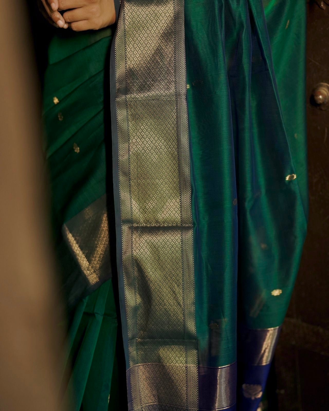 Dark Green and blue maheshwari dual tone saree with flower bootis all over