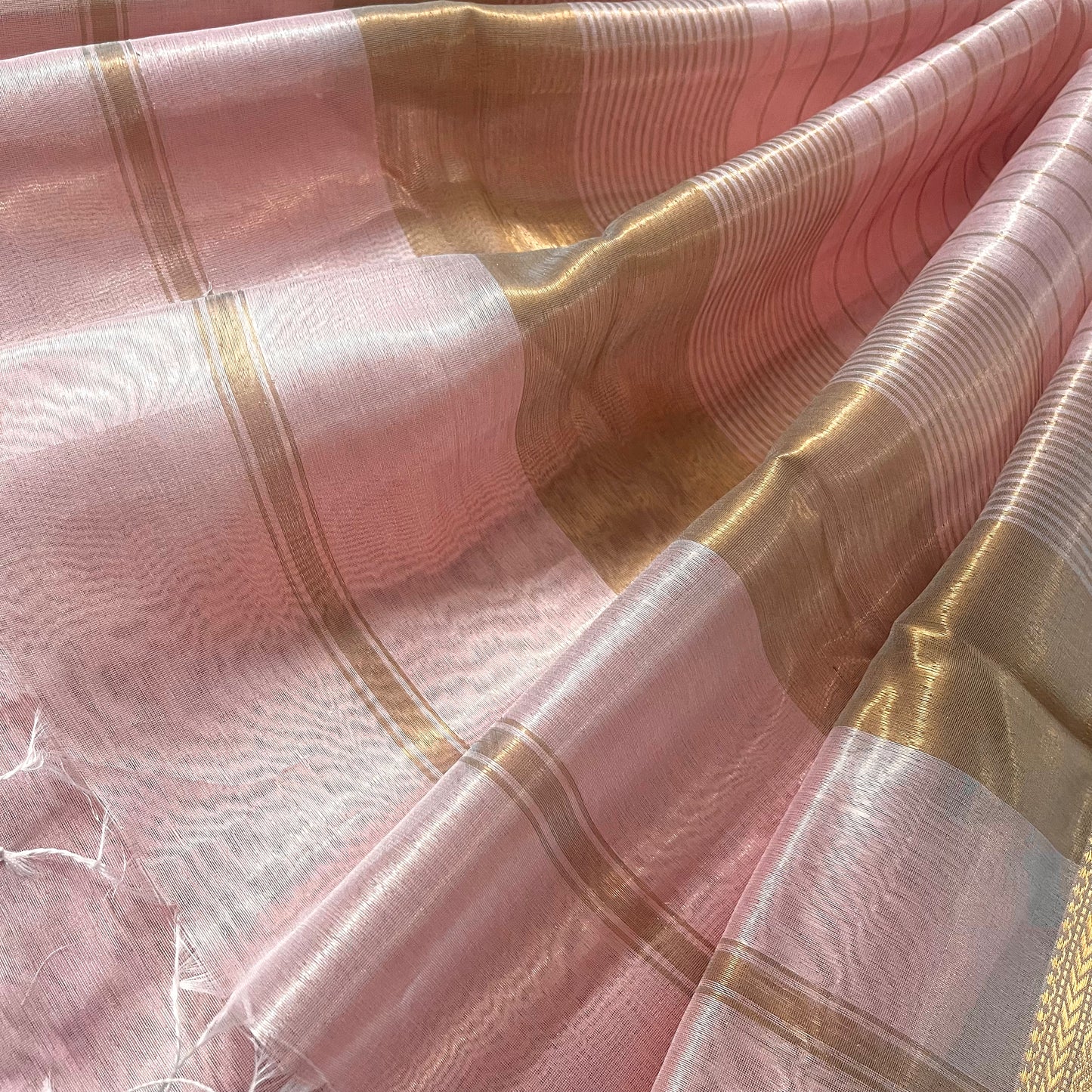 Peachish pink maheshwari tissue silk saree with zari pattern on pallu