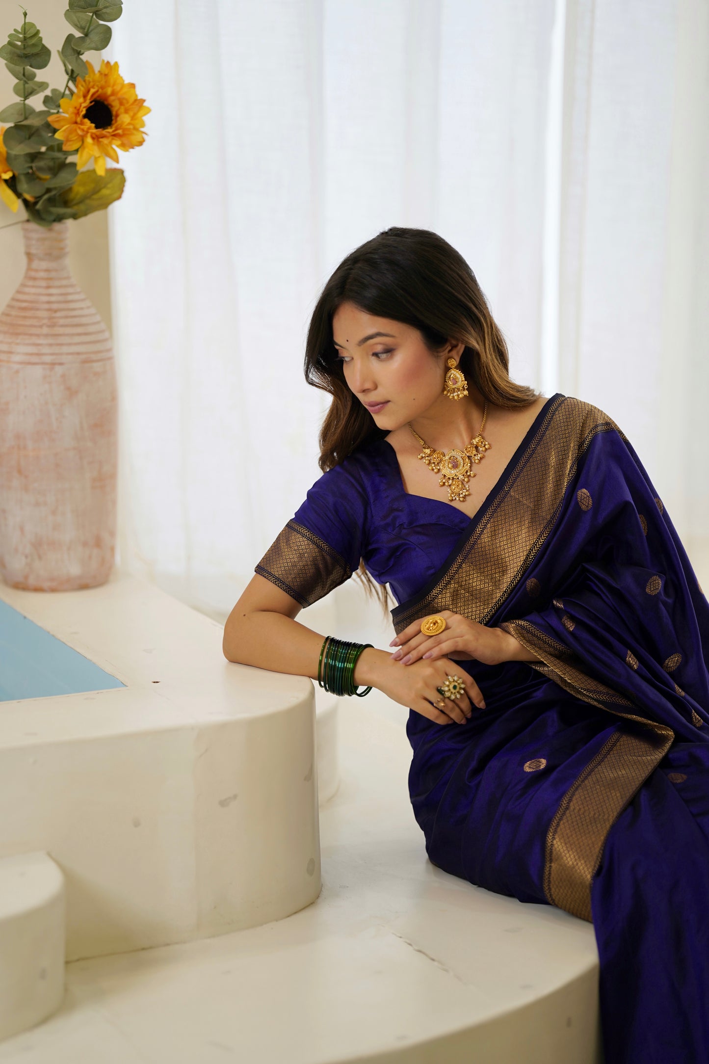 Dark blue maheshwari silk saree with zari bootis all over