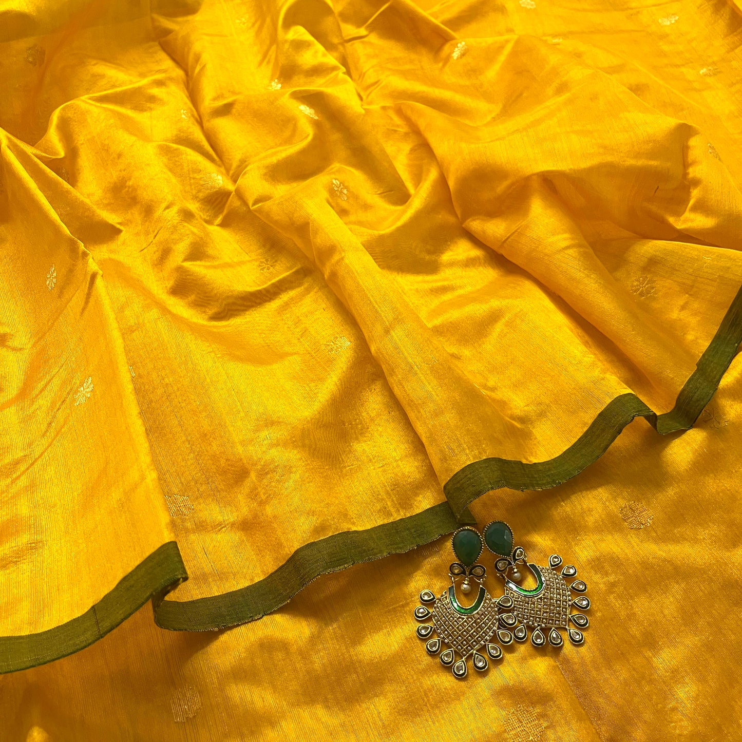 Yellow and green chanderi silk saree with flower bootis all over