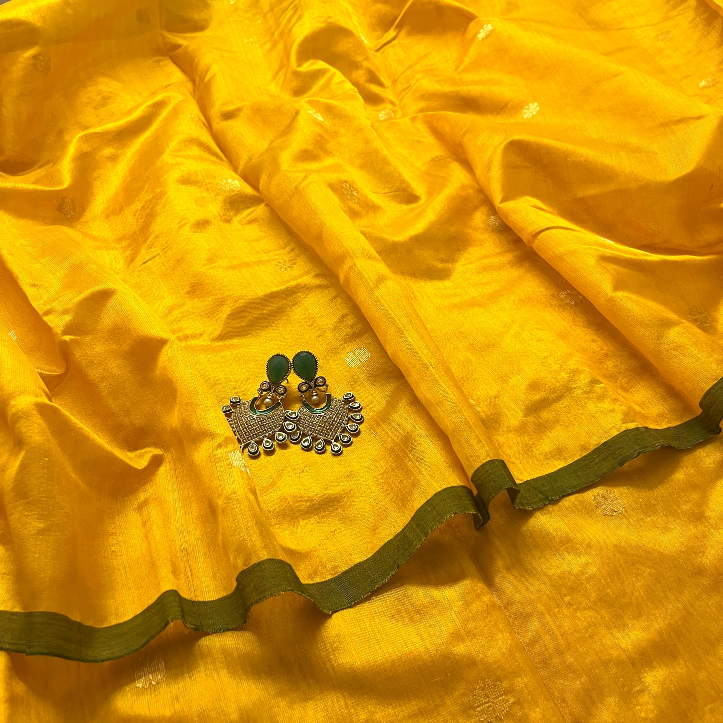 Yellow and green chanderi silk saree with flower bootis all over