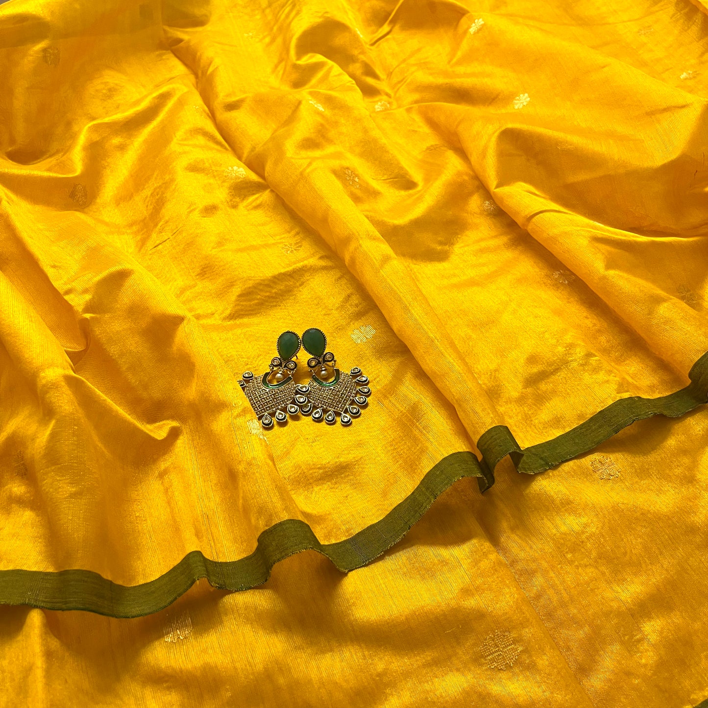 Yellow and green chanderi silk saree with flower bootis all over