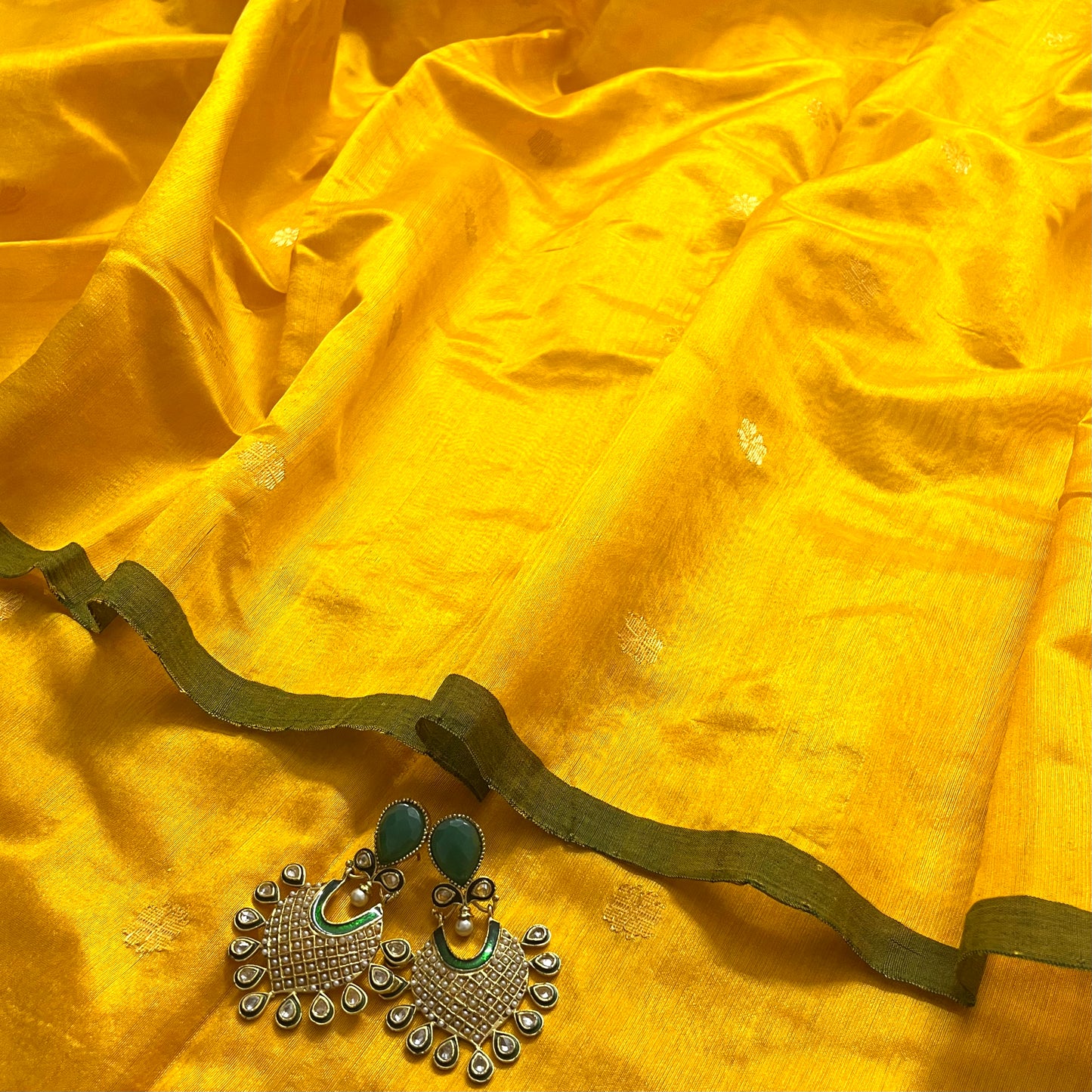 Yellow and green chanderi silk saree with flower bootis all over