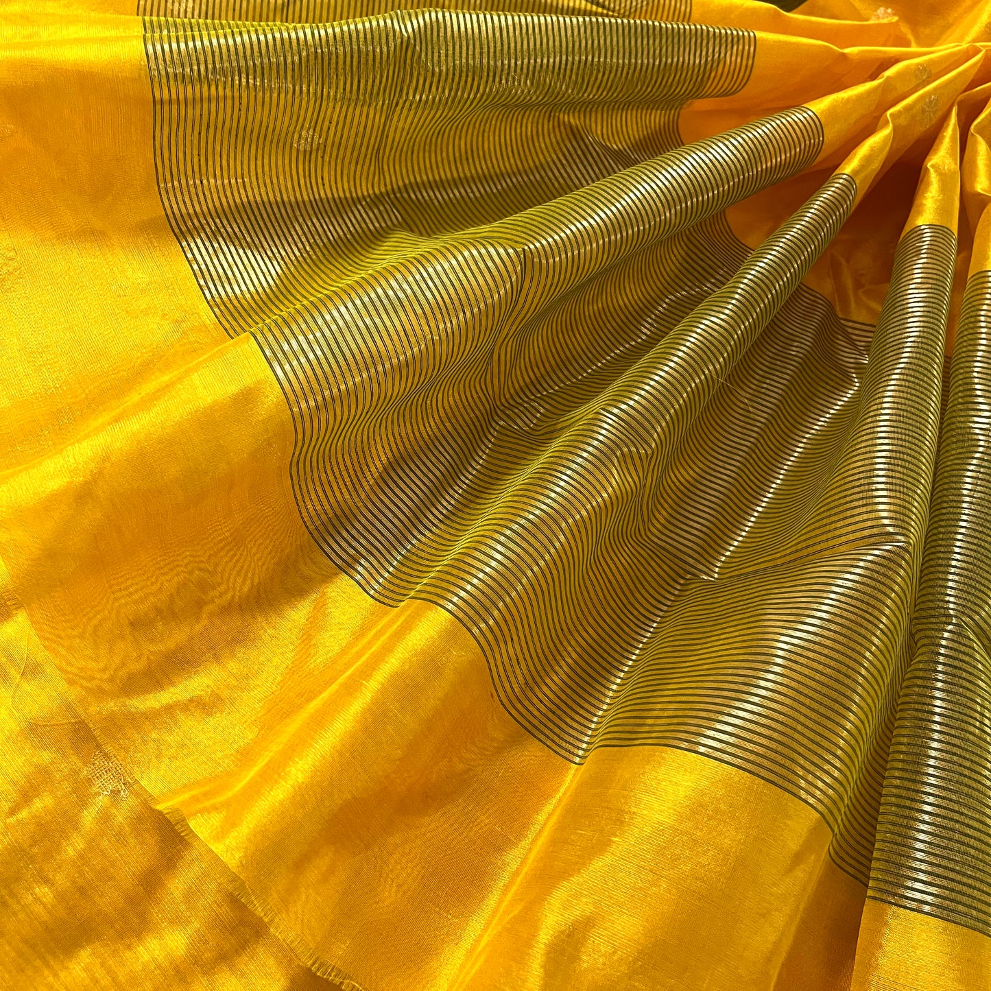 Yellow and green chanderi silk saree with flower bootis all over