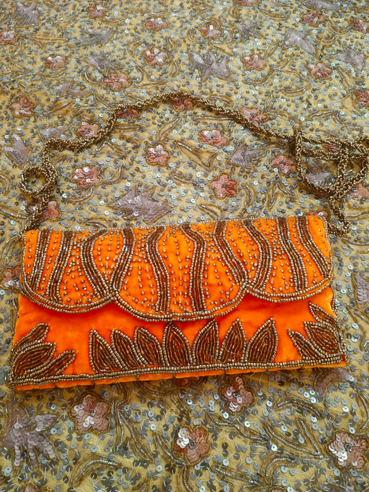 Orange embellished velvet purse