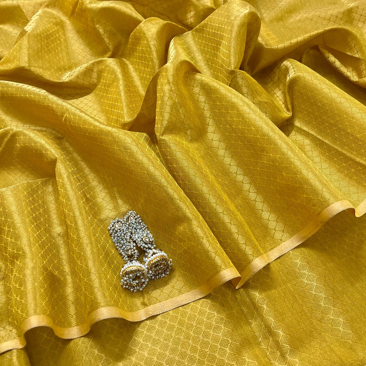 Amber gold maheshwari saree with zari pattern all over