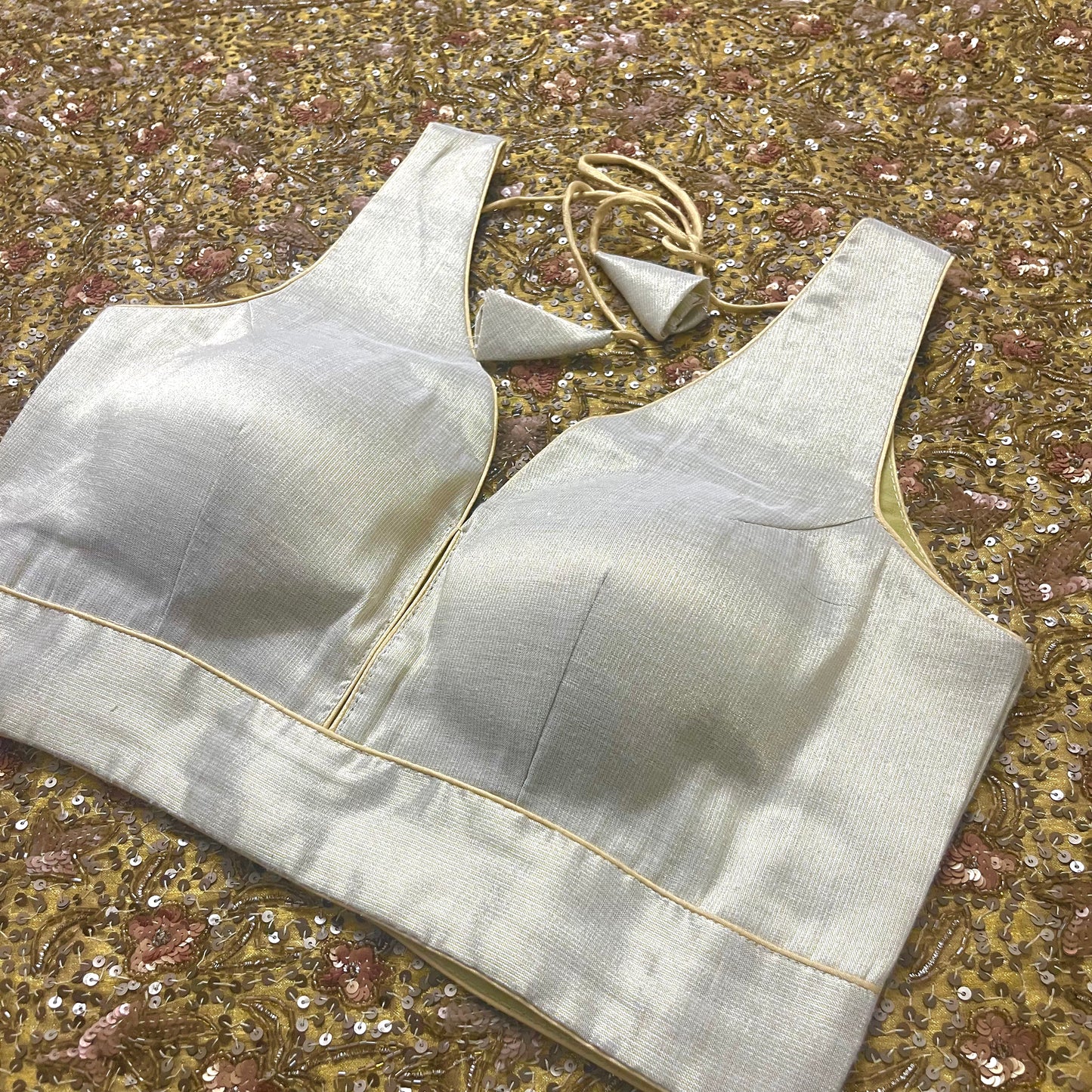 Light gold stitched padded silk blouse