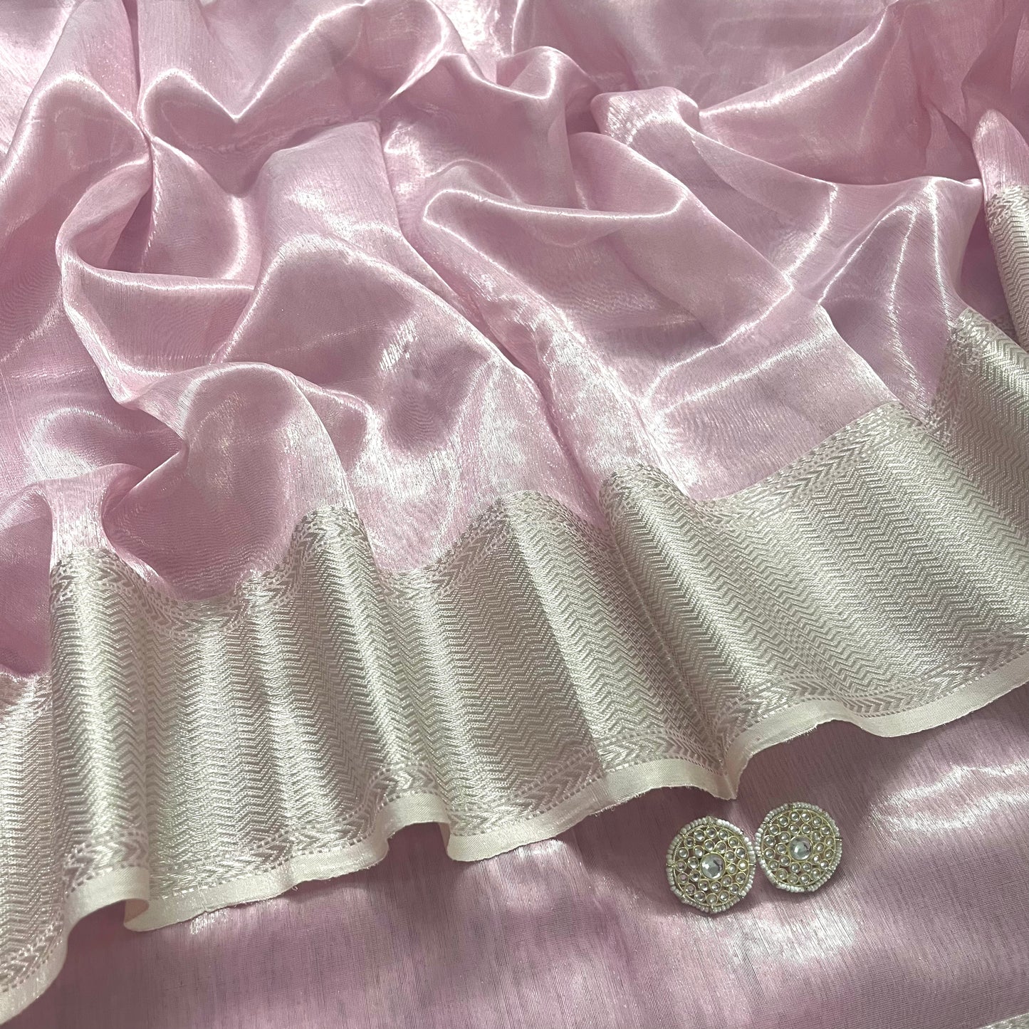 Light pink maheshwari tissue silk saree with zari pattern on pallu