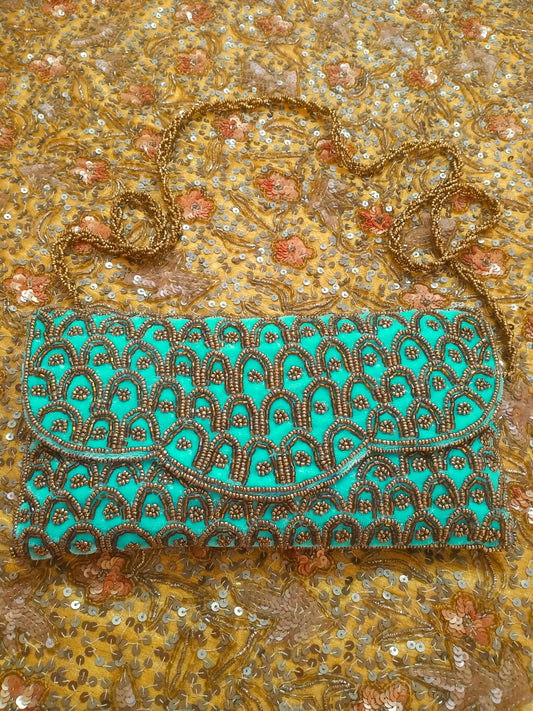 Turquoise embellished velvet purse