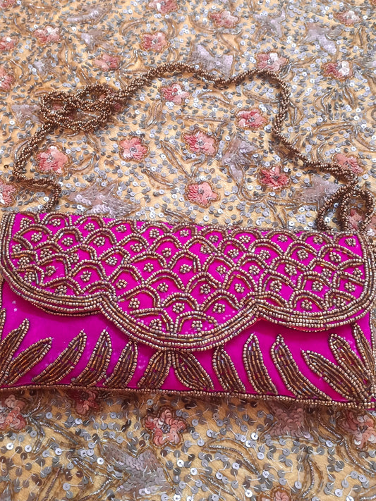 Pink embellished velvet purse