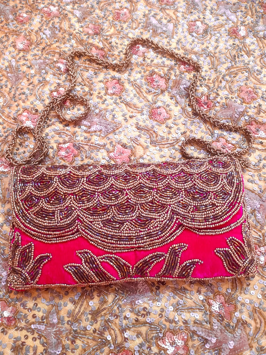 Pink embellished velvet purse