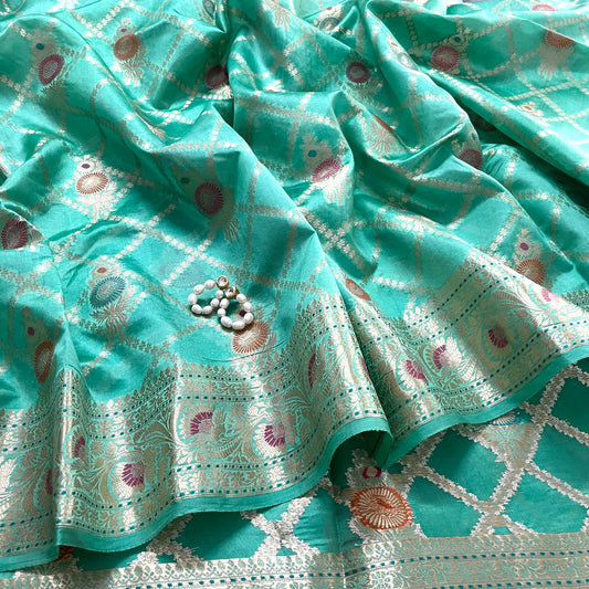 Sea green banarasi silk saree with zari jaal work all over