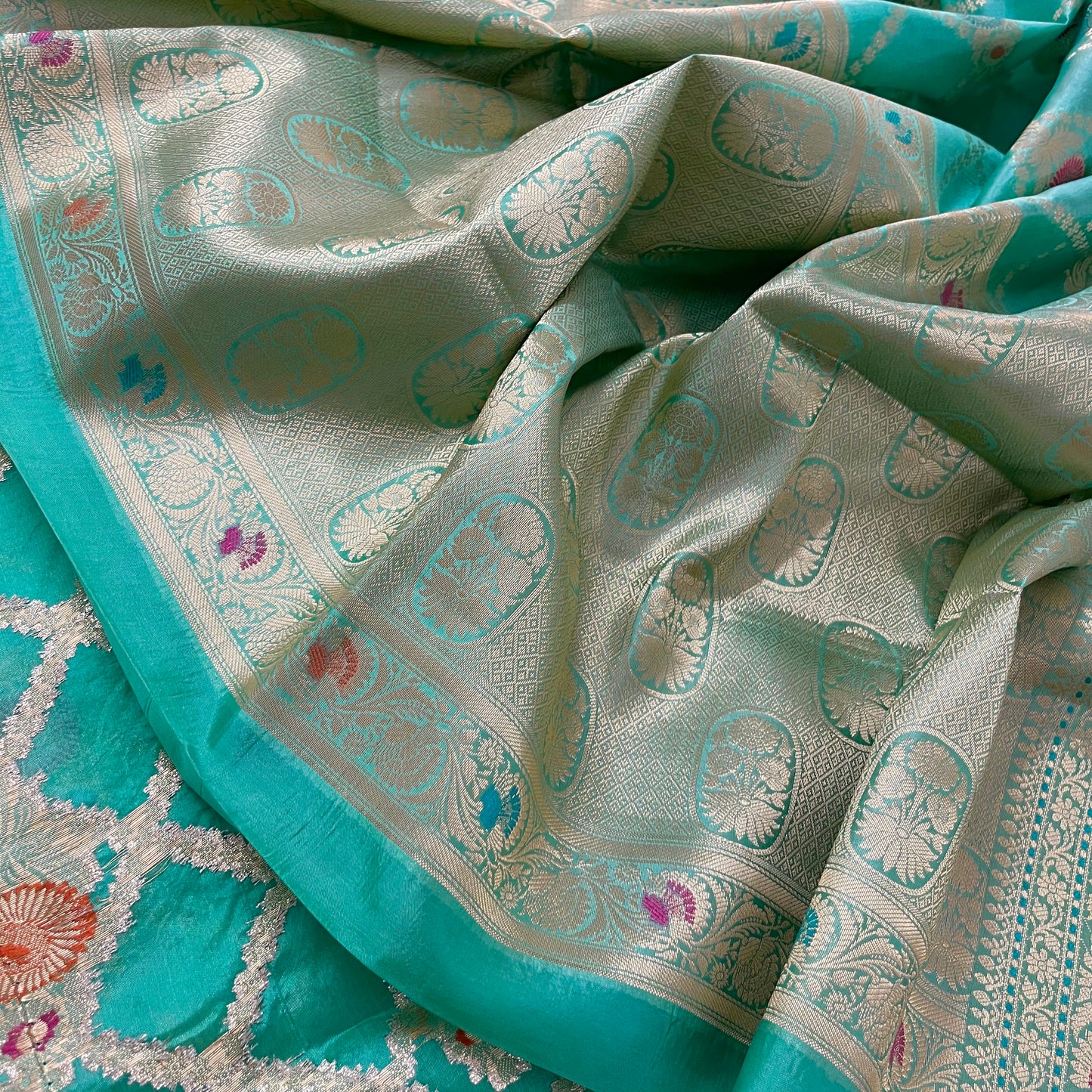 Sea green banarasi silk saree with zari jaal work all over