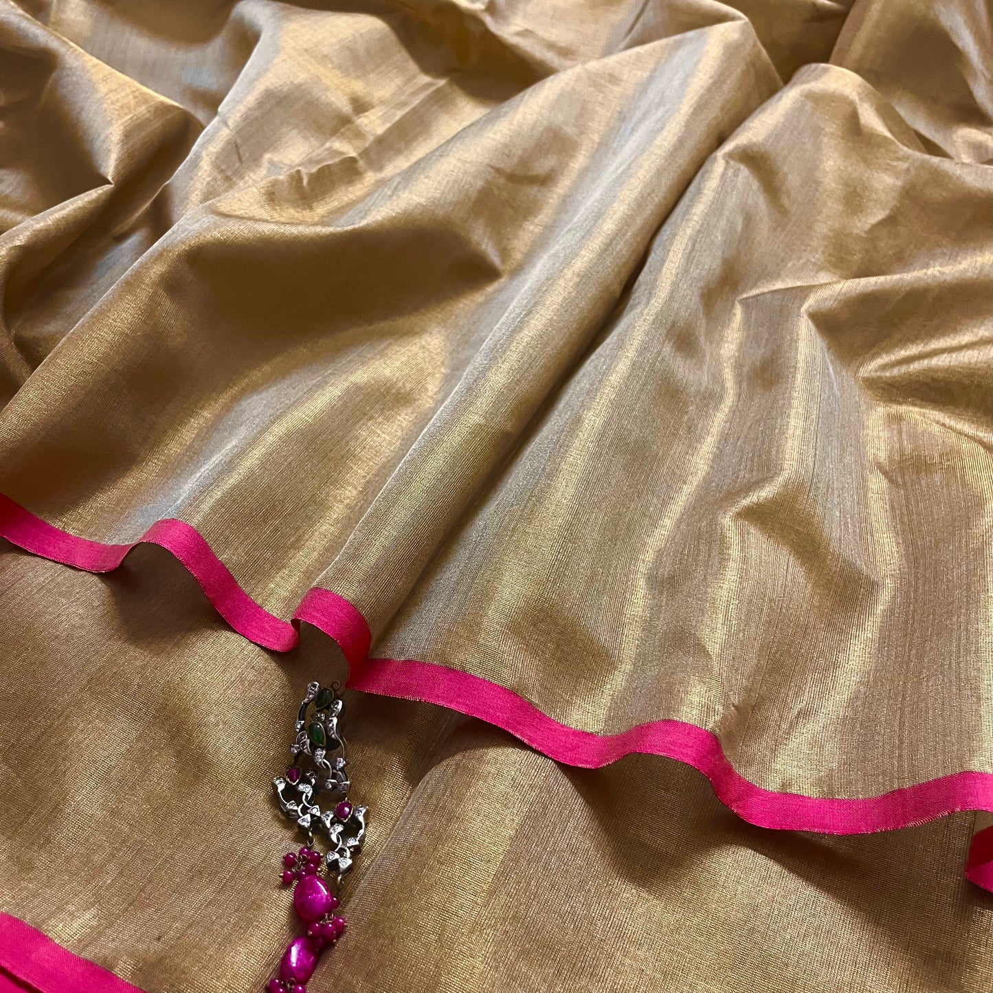 Antique gold & pink maheshwari tissue silk saree with zari lines on pallu