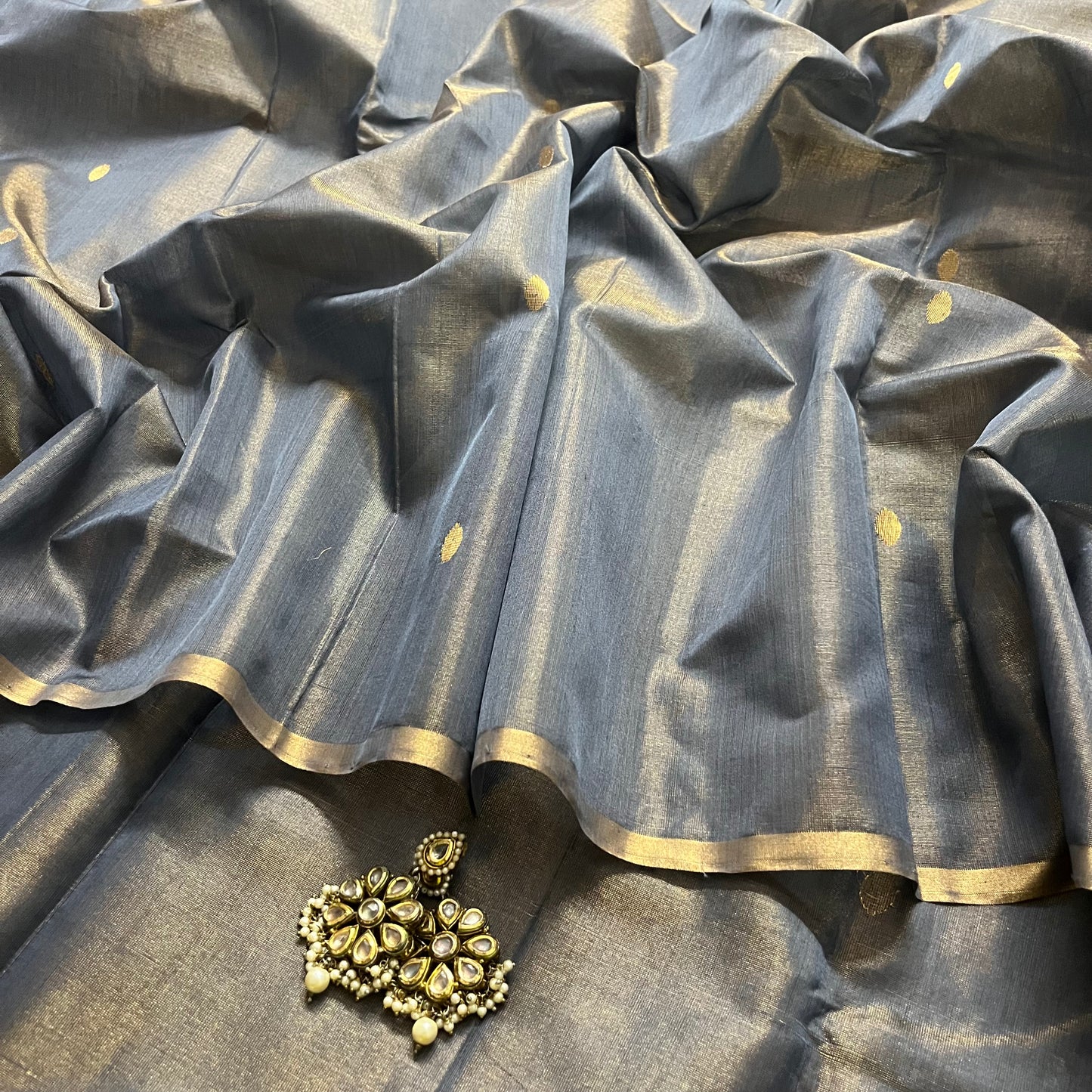 Grey gold maheshwari tissue silk saree with zari bootis all over