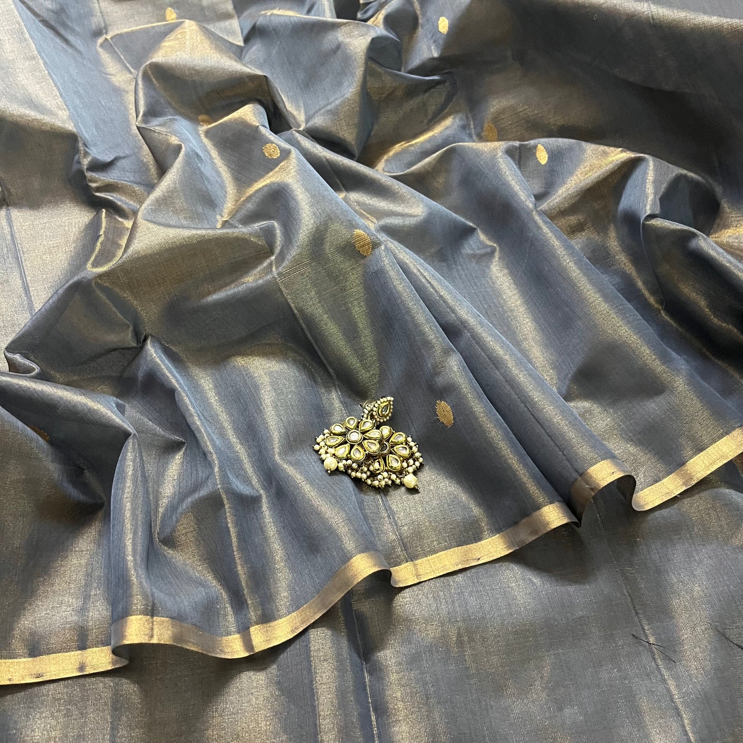Grey gold maheshwari tissue silk saree with zari bootis all over