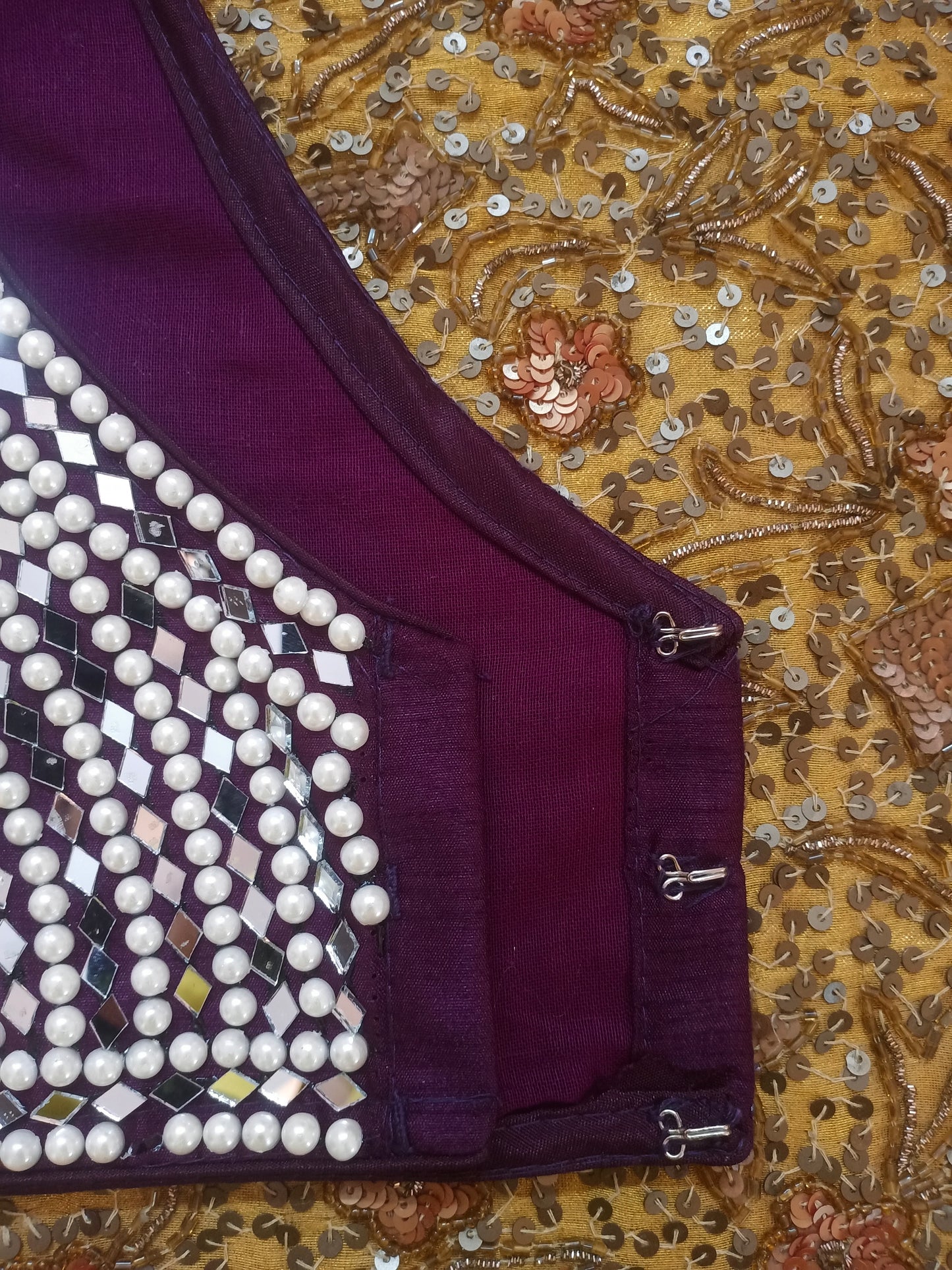 Wine stitched blouse with pearl and mirror work