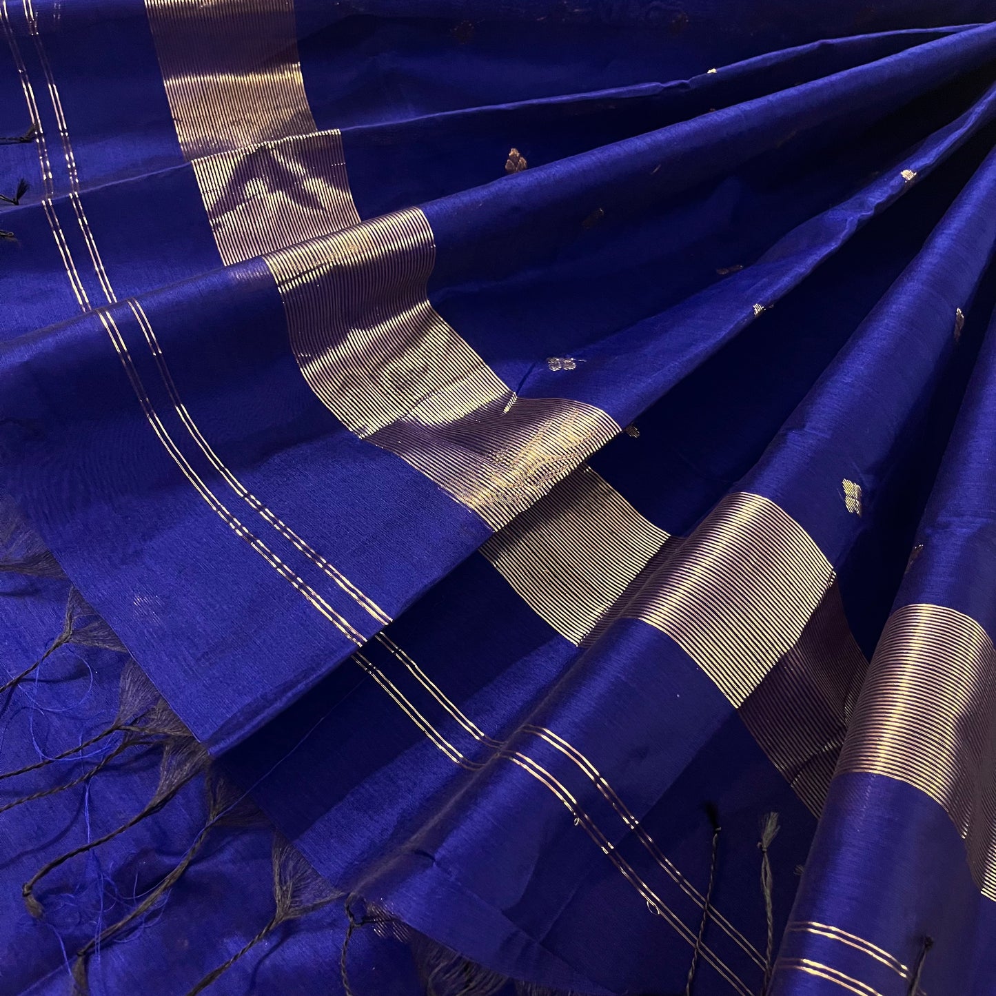 Dark blue maheshwari saree with zari bootis all over
