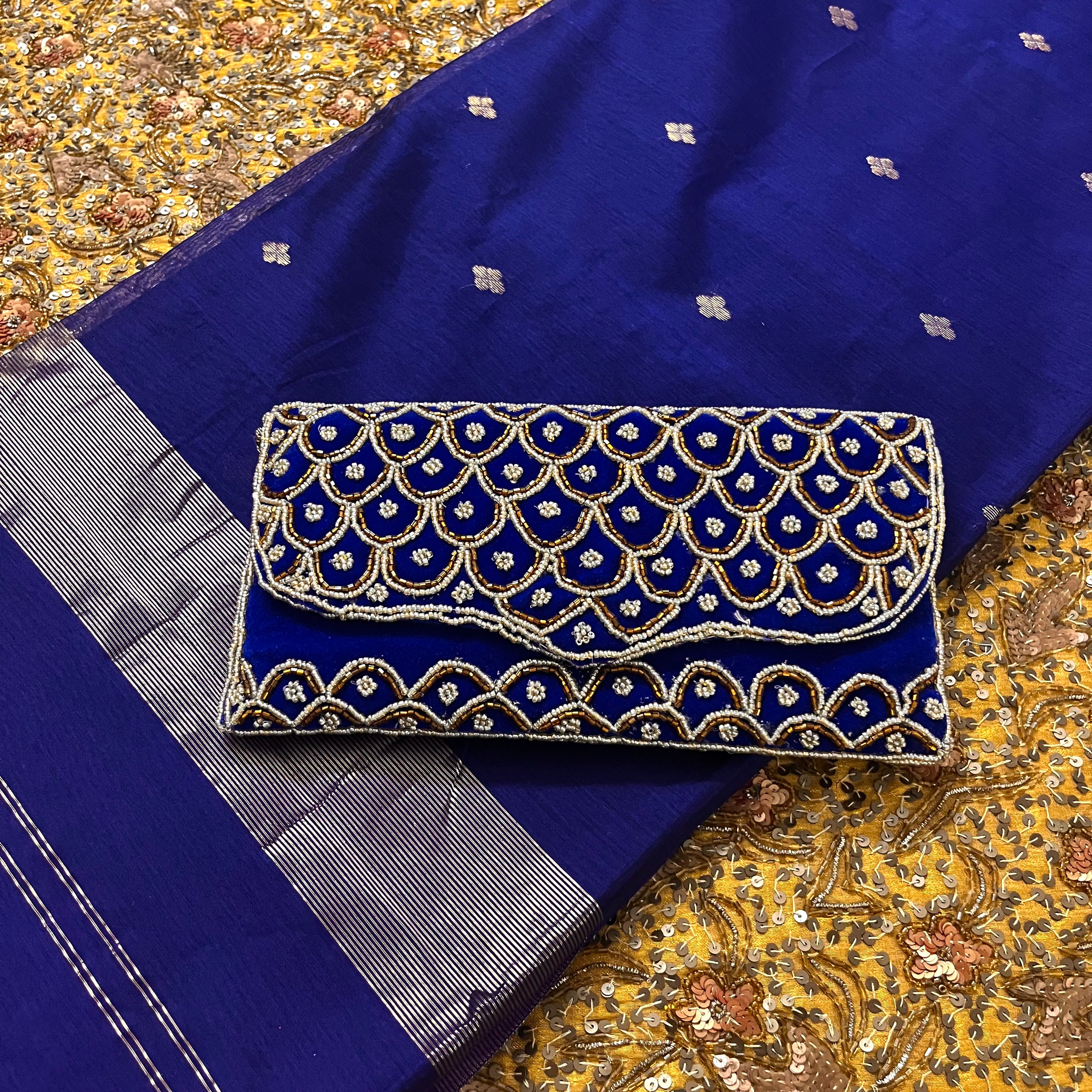 Dark blue maheshwari saree with zari bootis all over