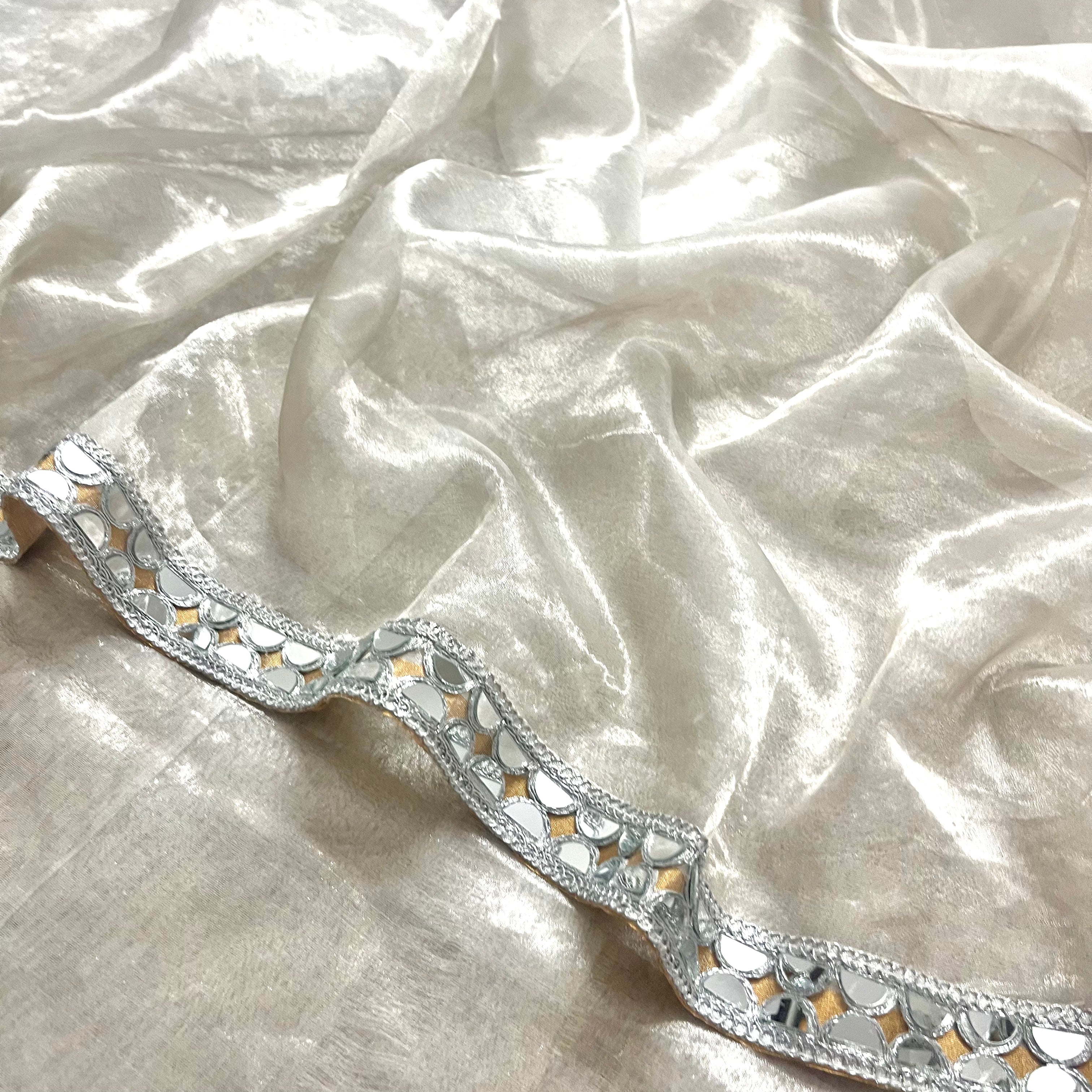 Molten silver and gold chanderi tissue silk saree with mirror work border